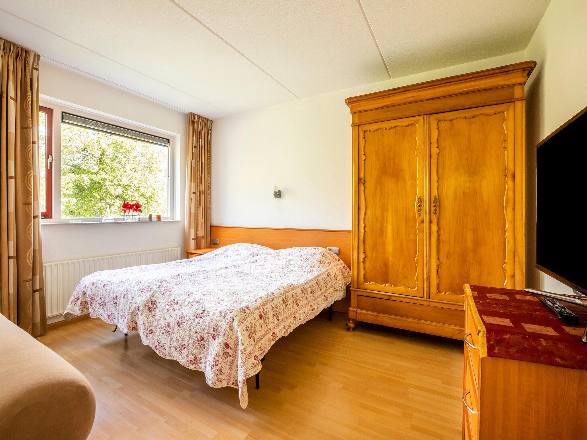 Een slaapkamer van Vakantiewoning Blauw in Hoorn