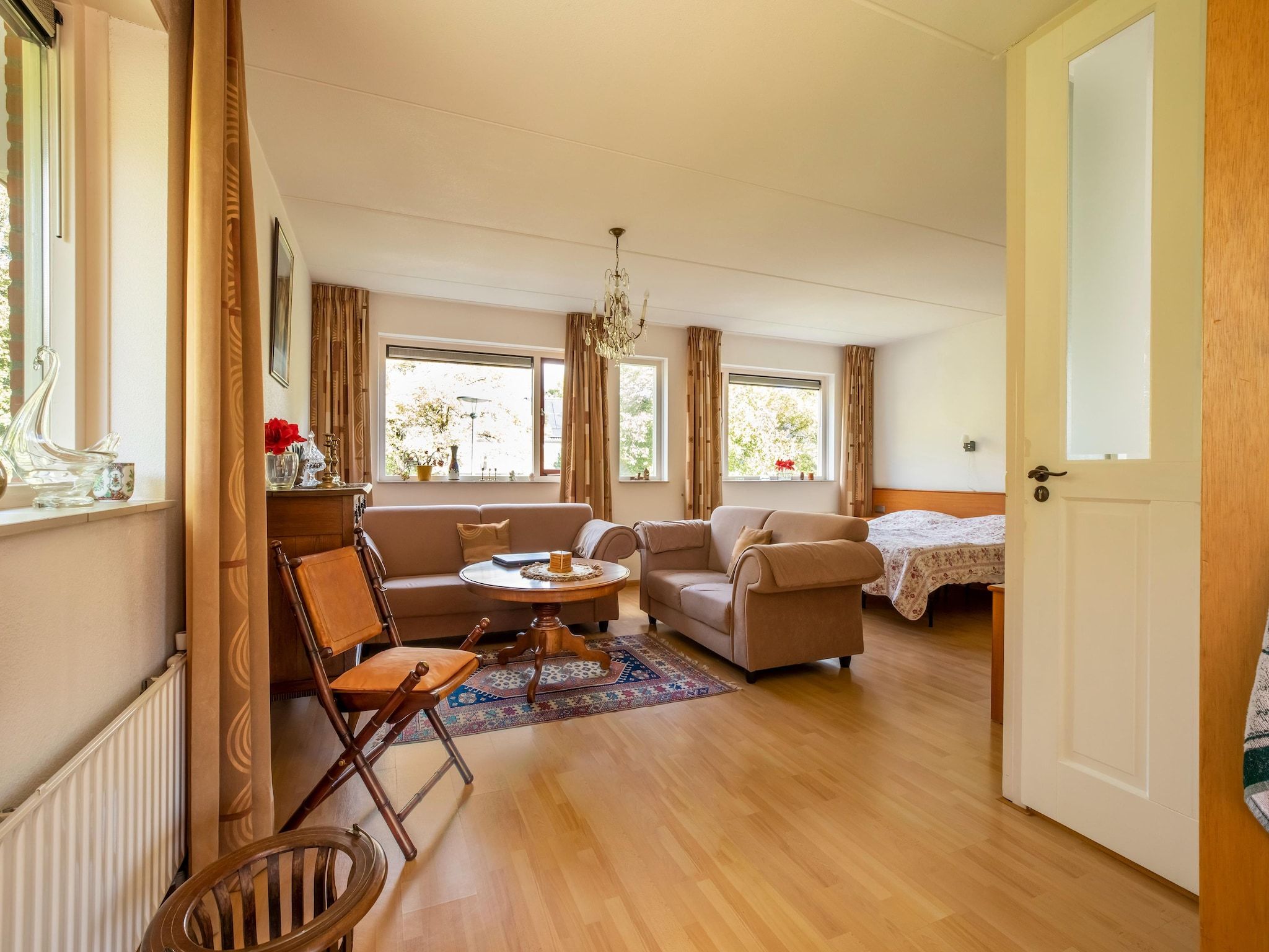 De woonkamer van Vakantiewoning Blauw in Hoorn