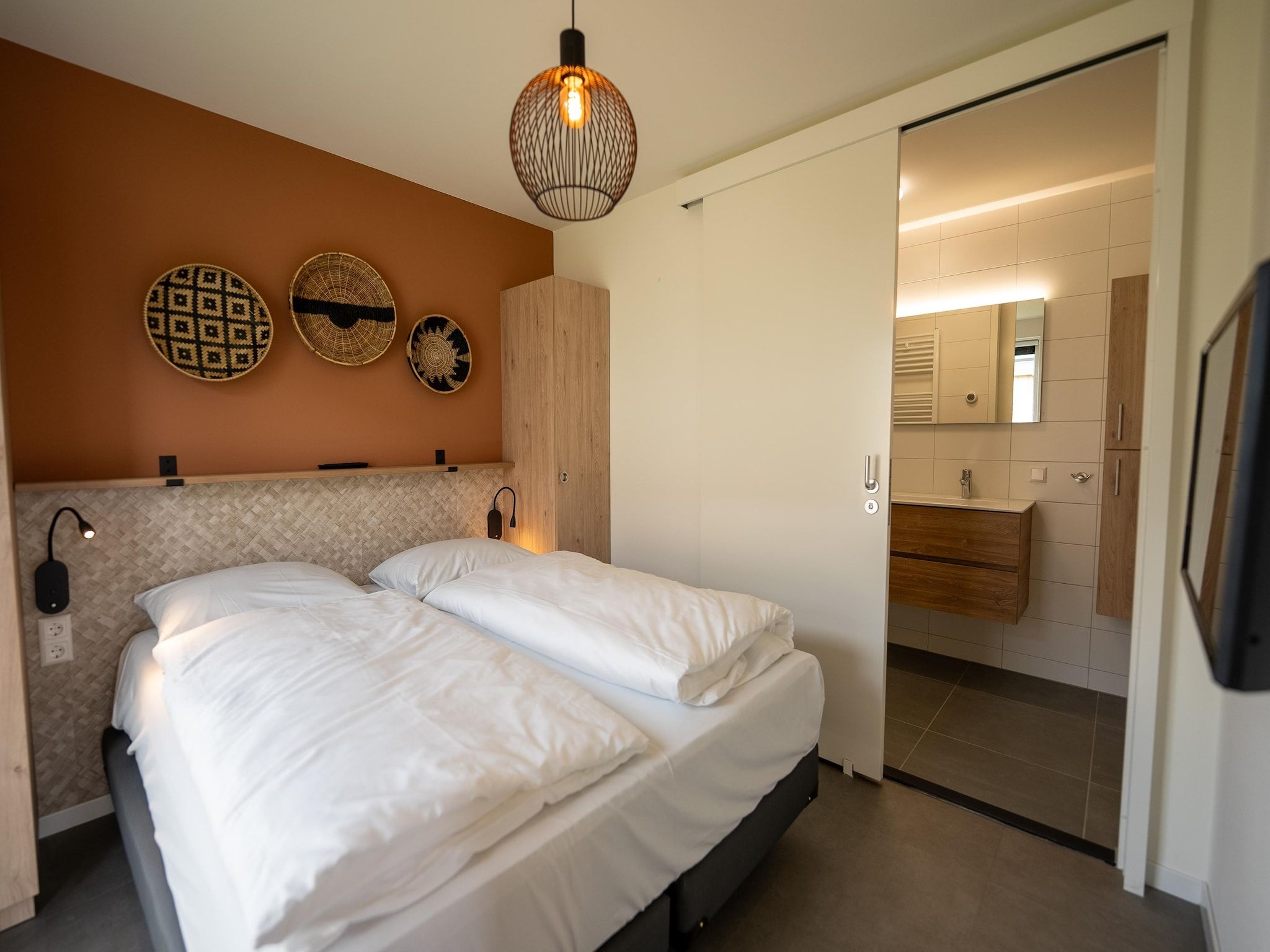 Een slaapkamer van Vakantiepark Zeebad 14 in Breskens