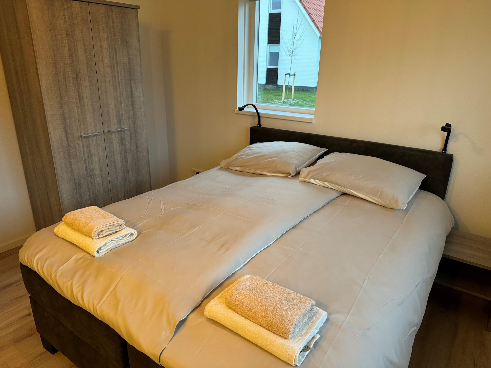 Een slaapkamer van De Scholekster Huis Nr 29 in Scherpenisse