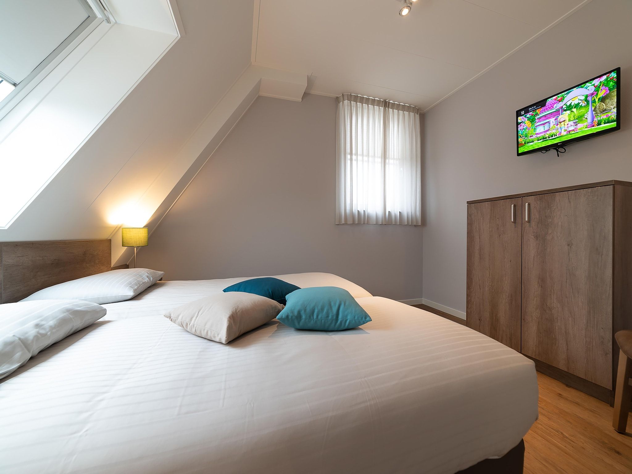 Een slaapkamer van Zeeuwse Pracht 8 p welness in Colijnsplaat