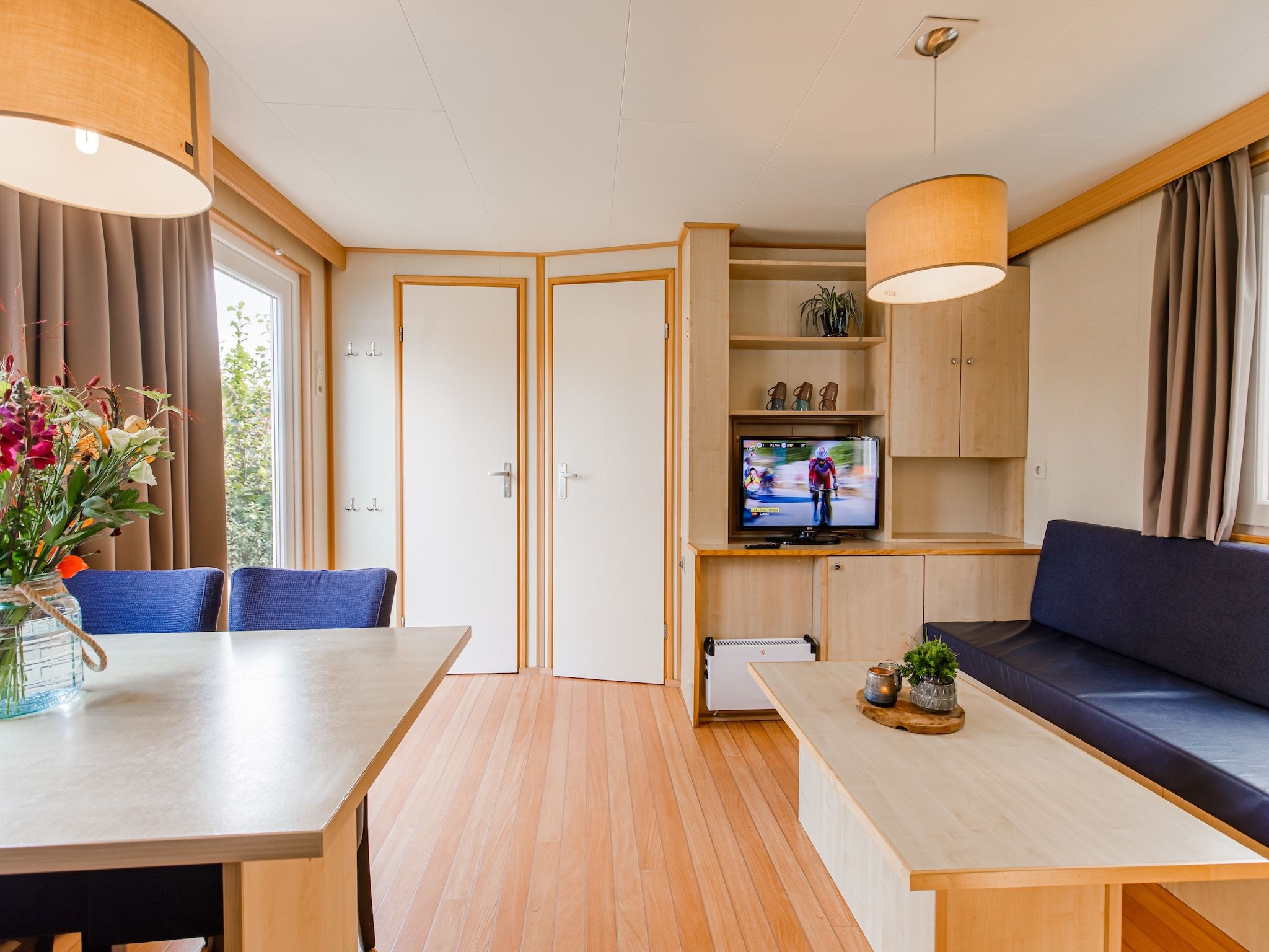 De woonkamer van Vakantiepark Leukermeer 2 in Well