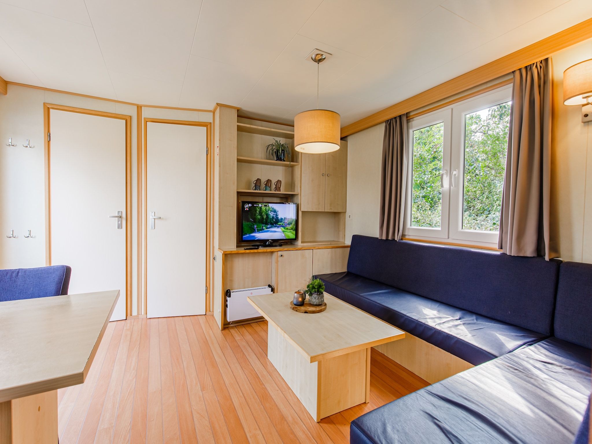 De woonkamer van Vakantiepark Leukermeer 2 in Well
