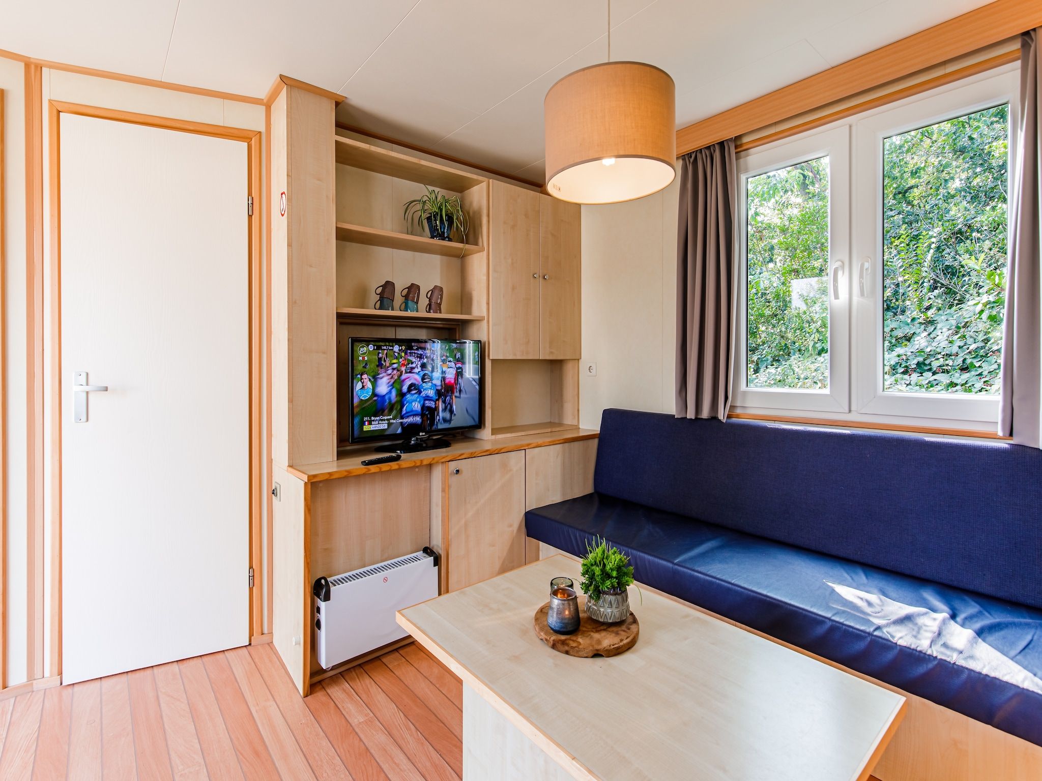 De woonkamer van Vakantiepark Leukermeer 4 in Well