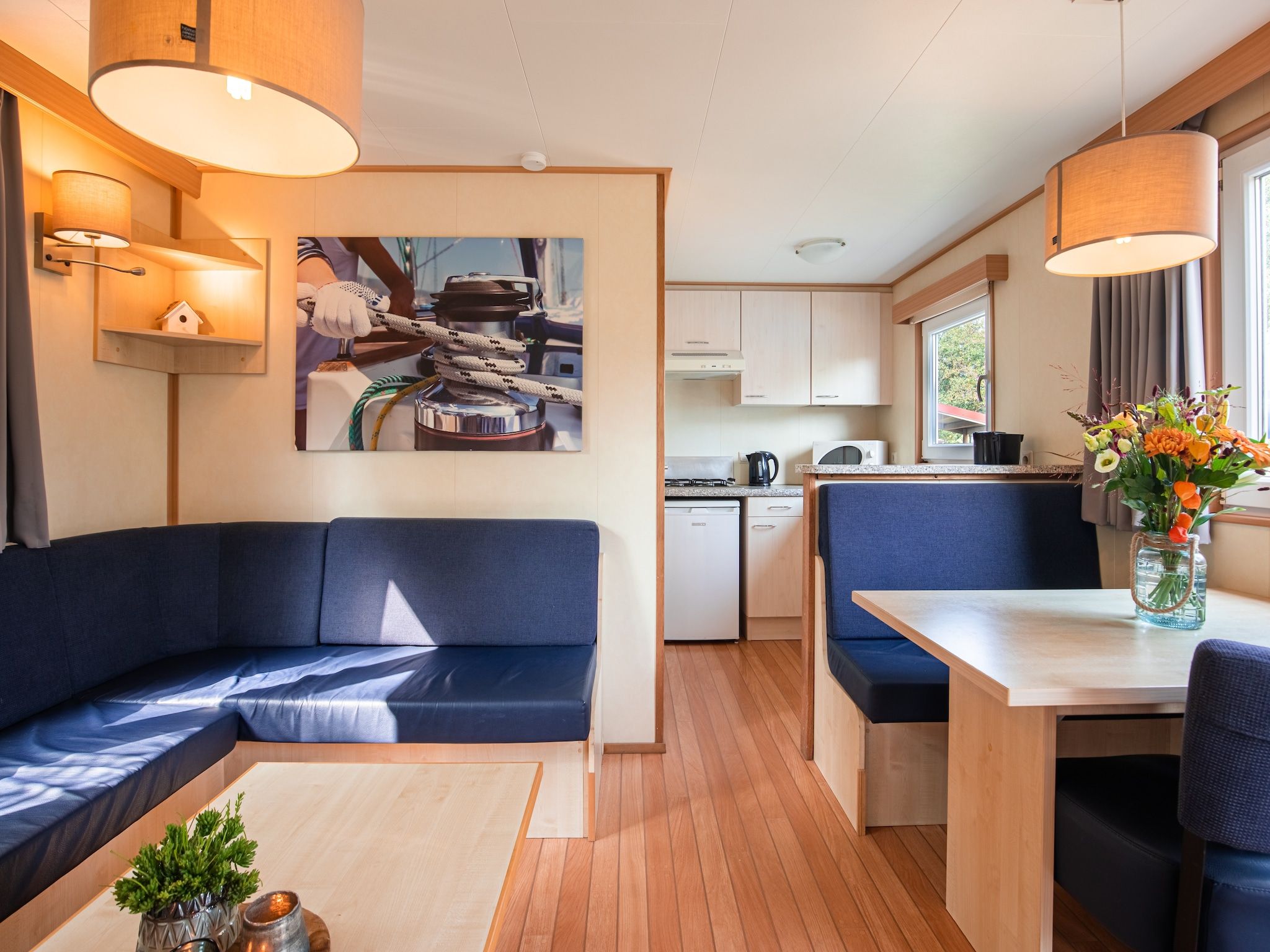 De woonkamer van Vakantiepark Leukermeer 6 in Well