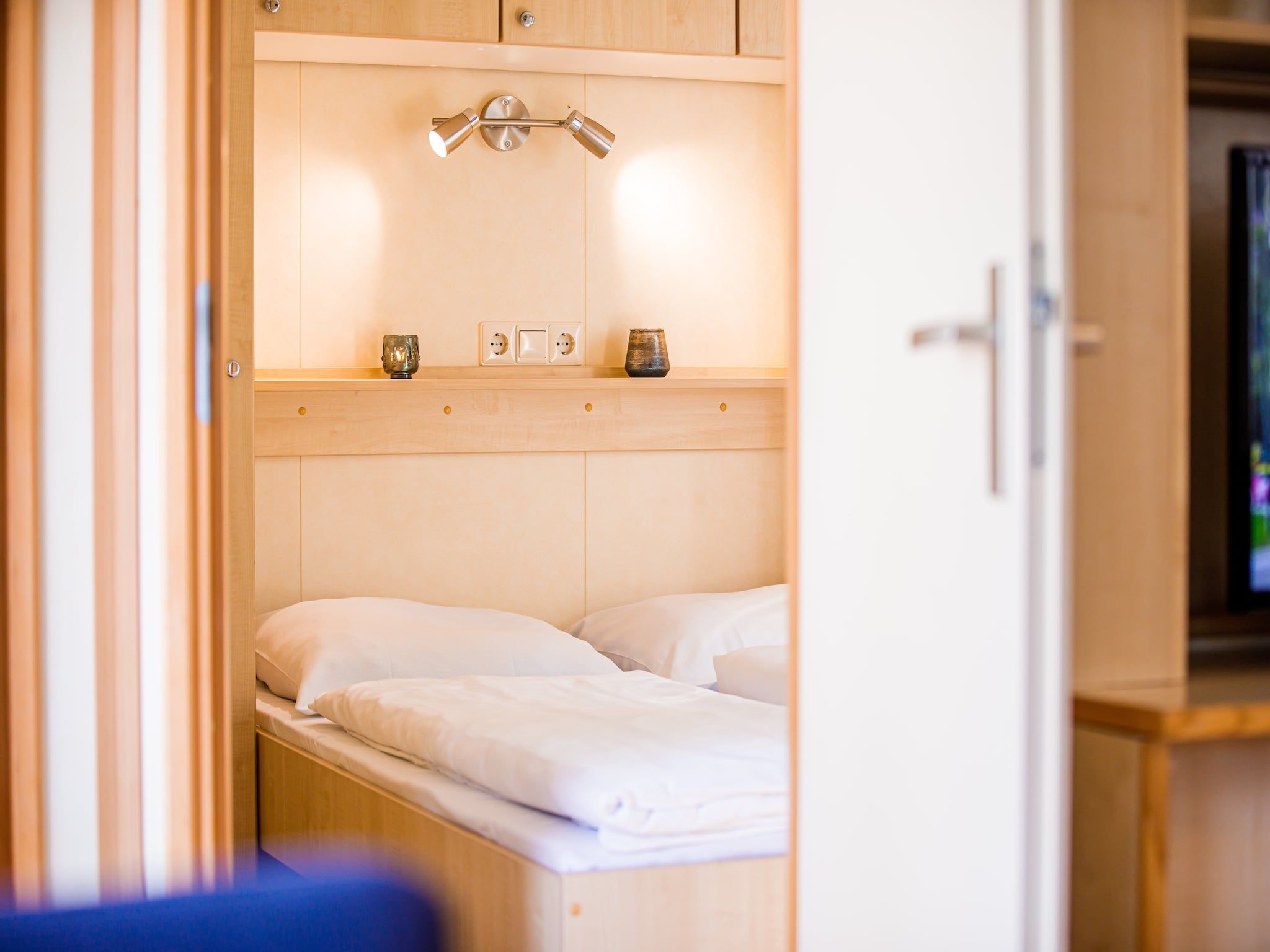 Een slaapkamer van Vakantiepark Leukermeer 6 in Well