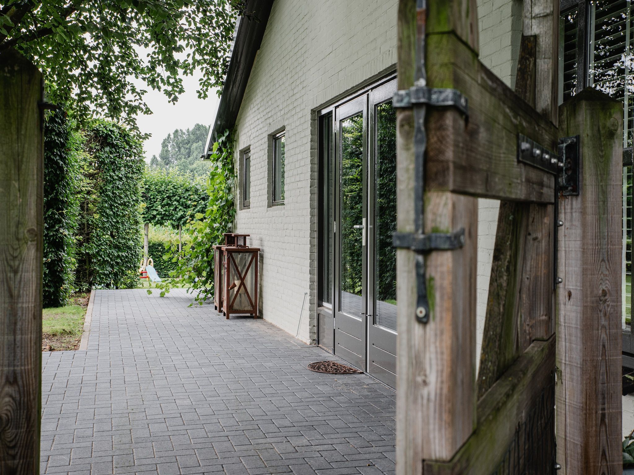 De buitenkant van Dorpswoning De Volbloed in Leende