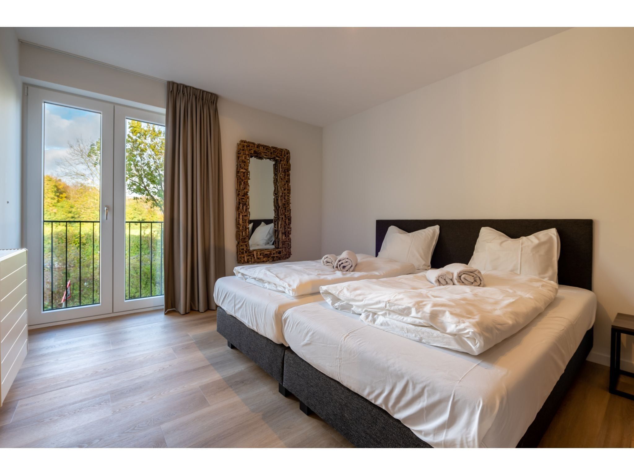 Een slaapkamer van Harbour Loft 1N Résidence Marina polderzicht in Kamperland