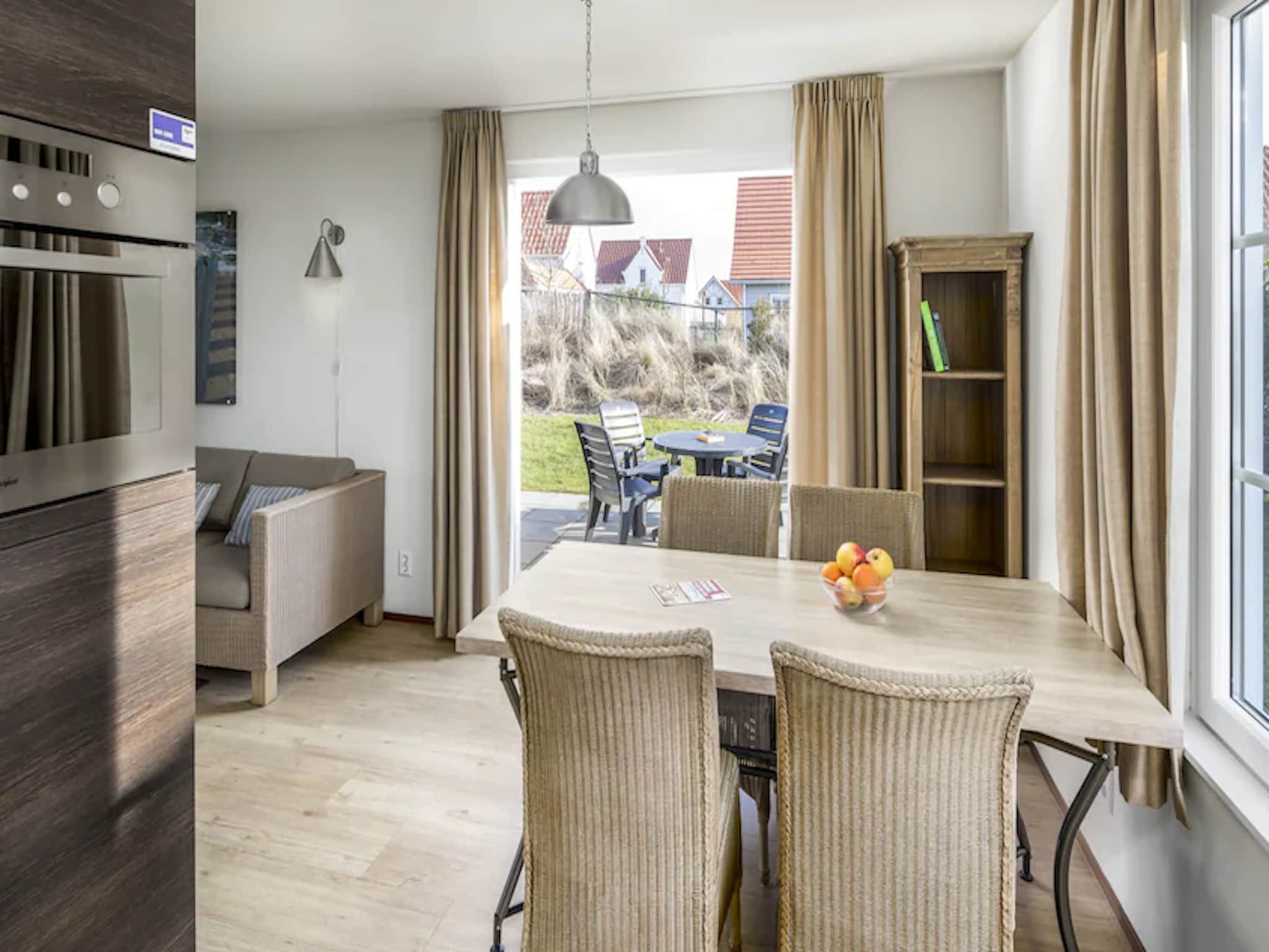 De woonkamer van Noordzee Residence Cadzand-Bad 22 in Cadzand-Bad