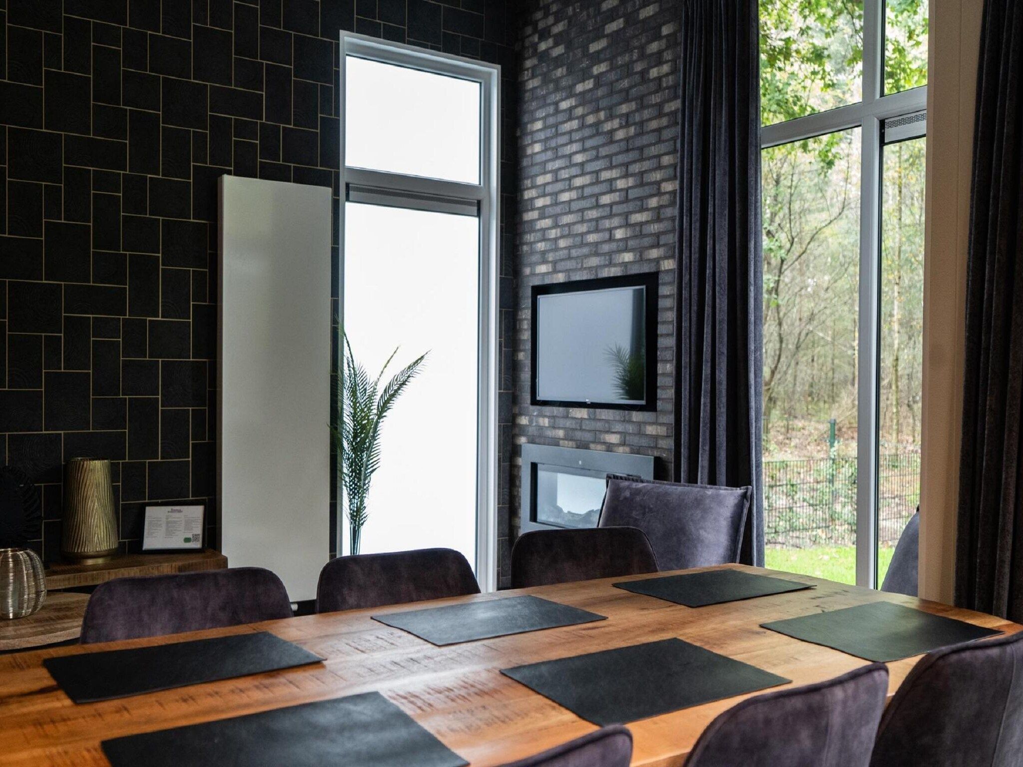 De eetkamer van Vakantiepark De Rimboe & De Woeste Hoogte 39 in Hoenderloo