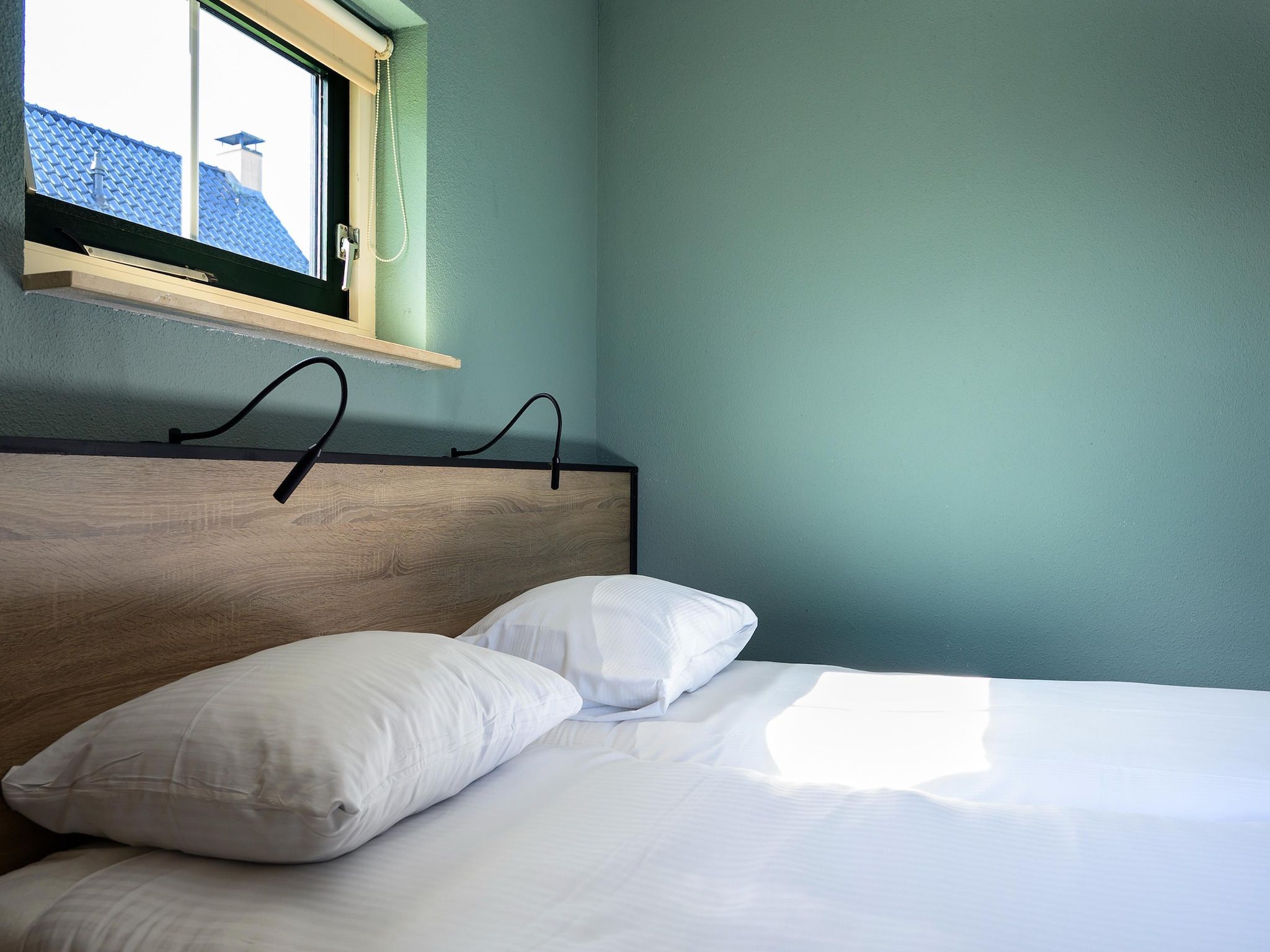 Een slaapkamer van 10 pers Lieskehuis Wellness de luxe met sauna buitenspa in Groningen