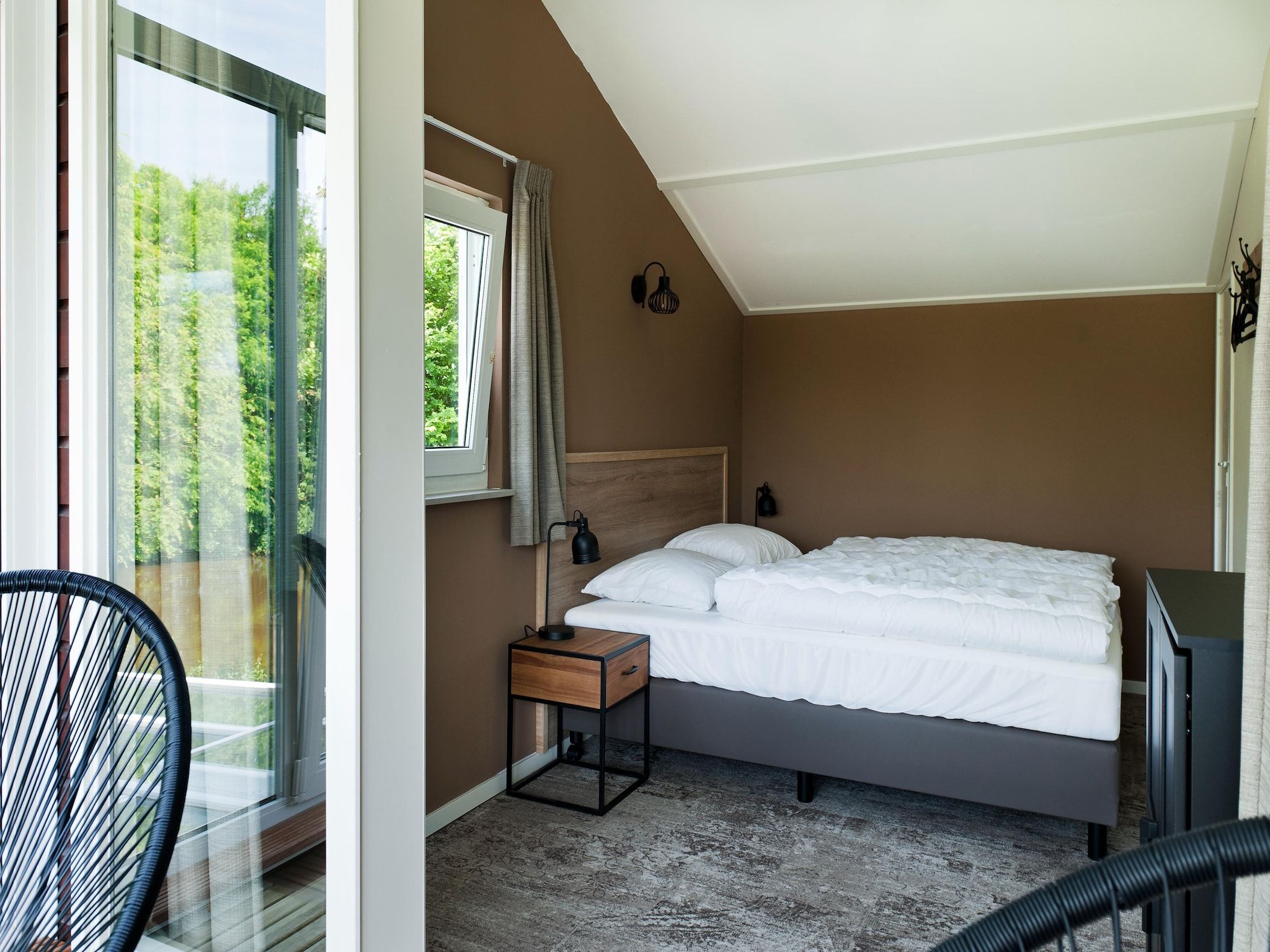 Een slaapkamer van 8 pers Metbroekhuis Wellness de luxe met sauna & buitenspa in Groningen