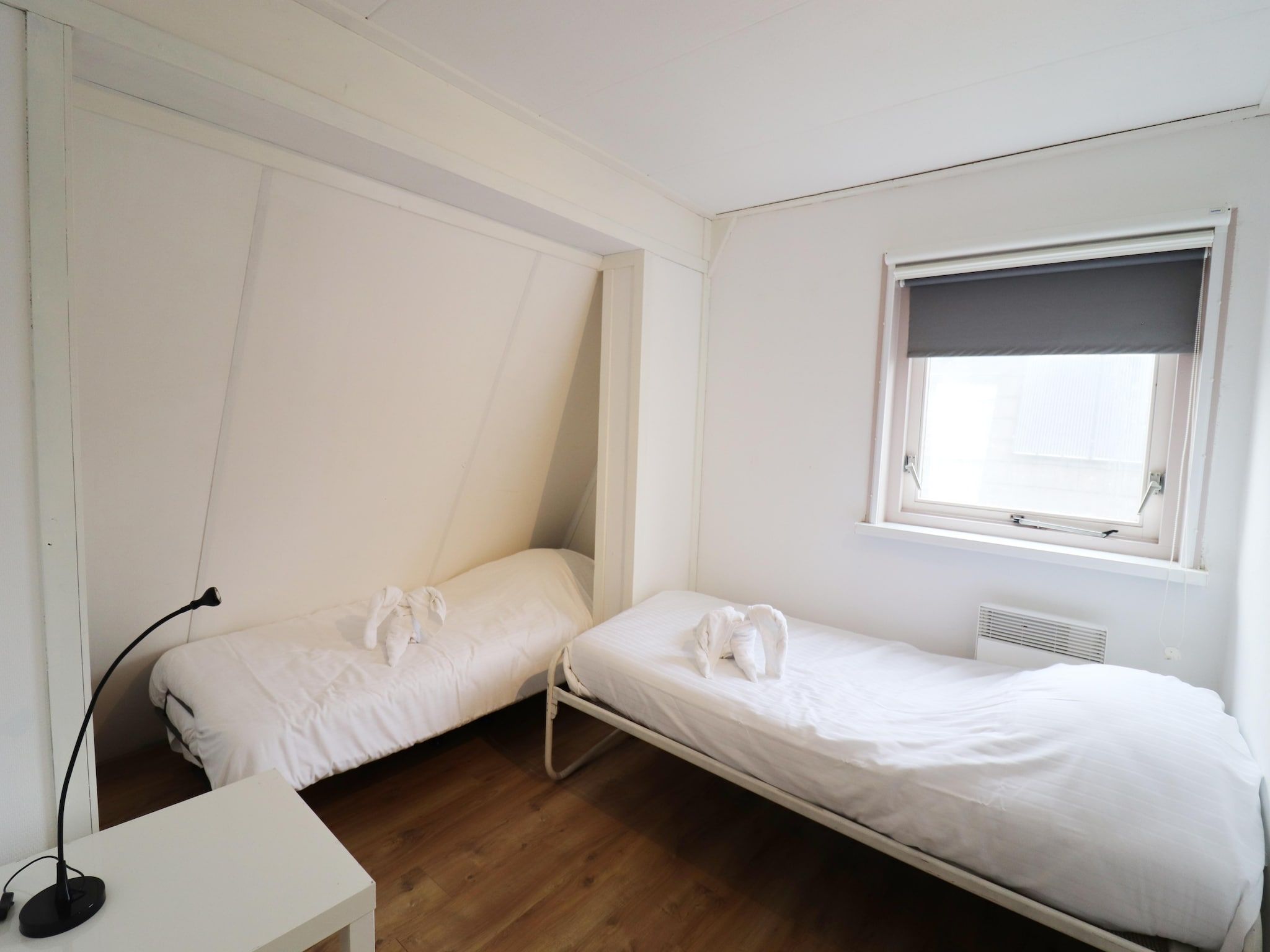 Een slaapkamer van Combinatie nr 105 en 110 in Grou
