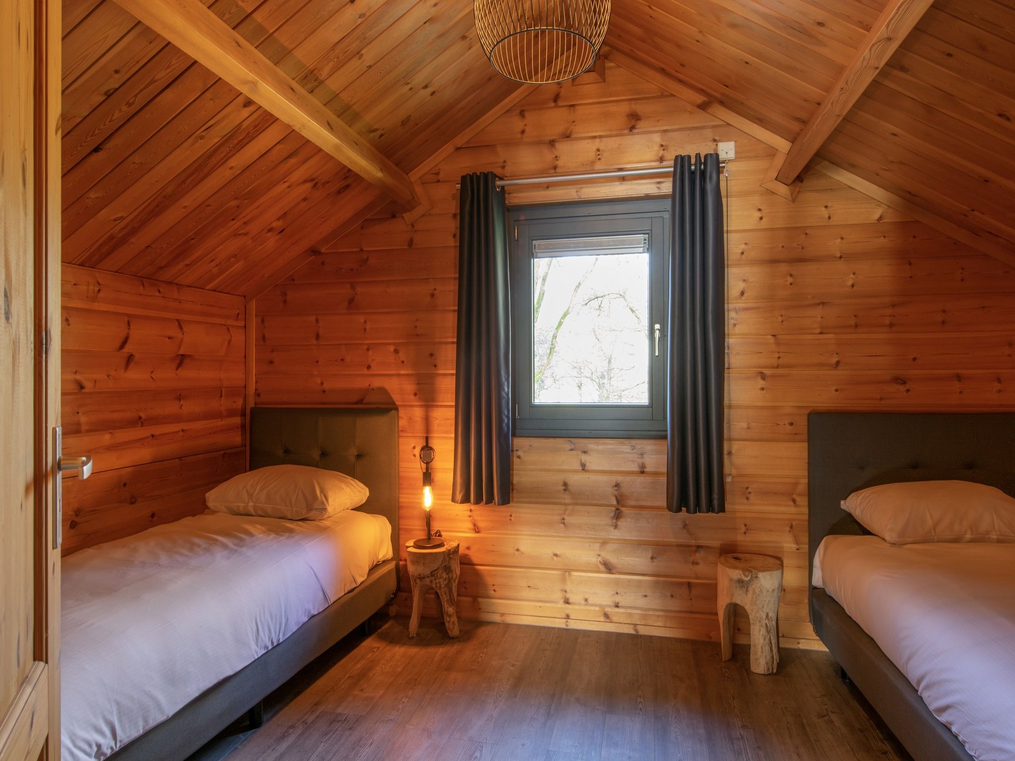 Een slaapkamer van Vakantiepark Klein Vink 22 in Arcen