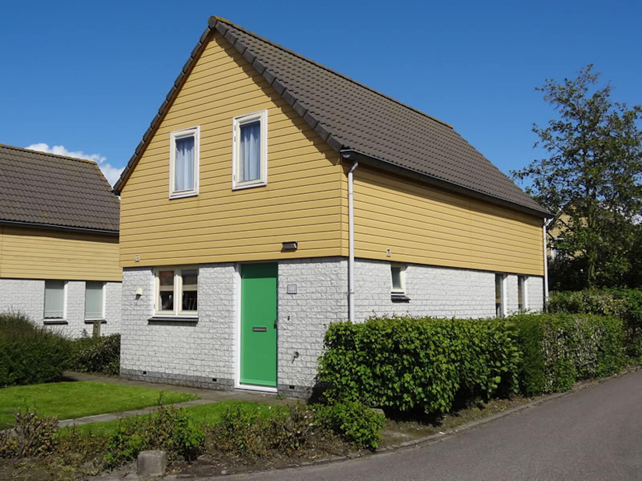 De buitenkant van Villapark De Oesterbaai 111 in Wemeldinge
