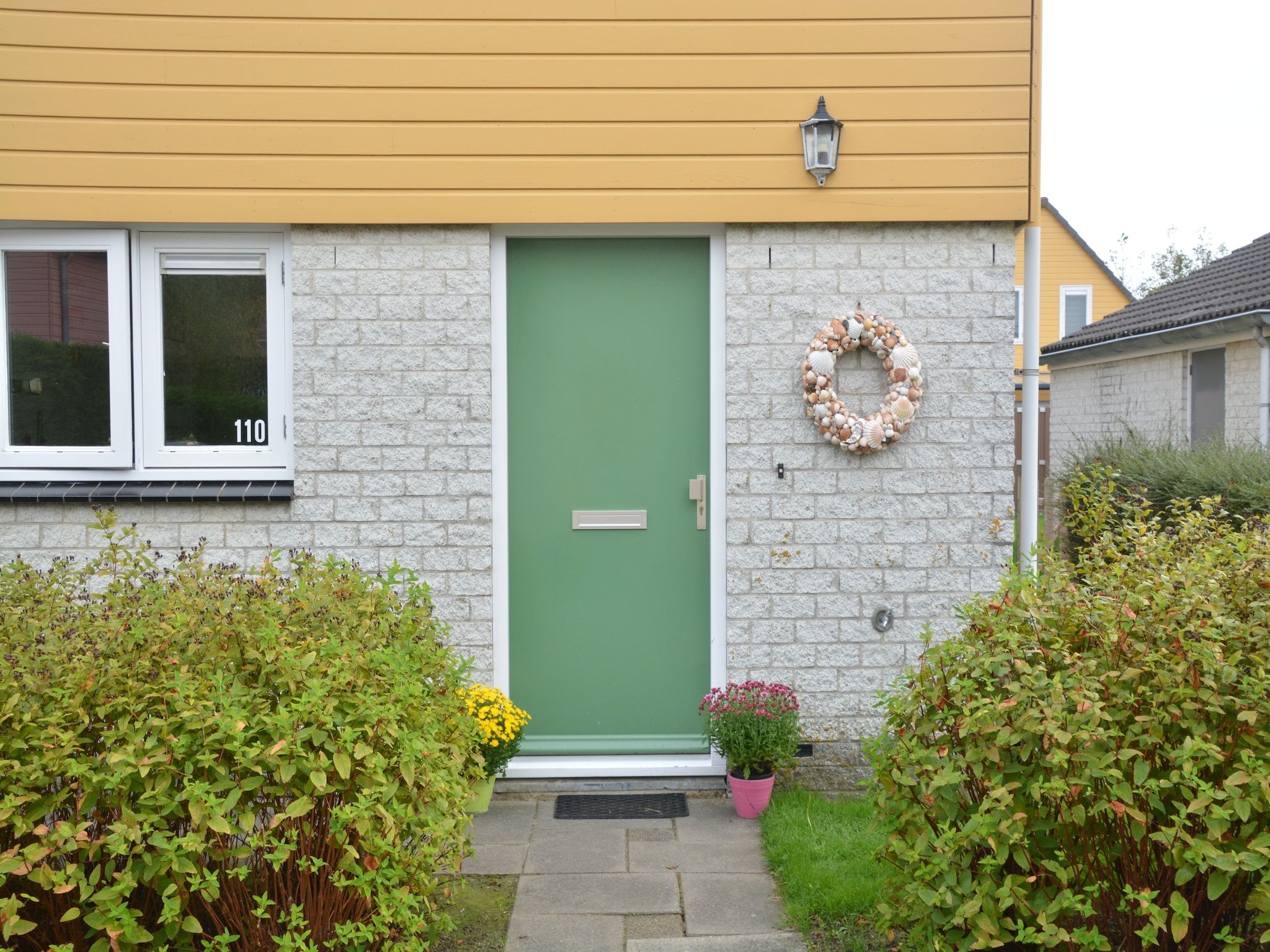 De buitenkant van Villapark De Oesterbaai 110 in Wemeldinge