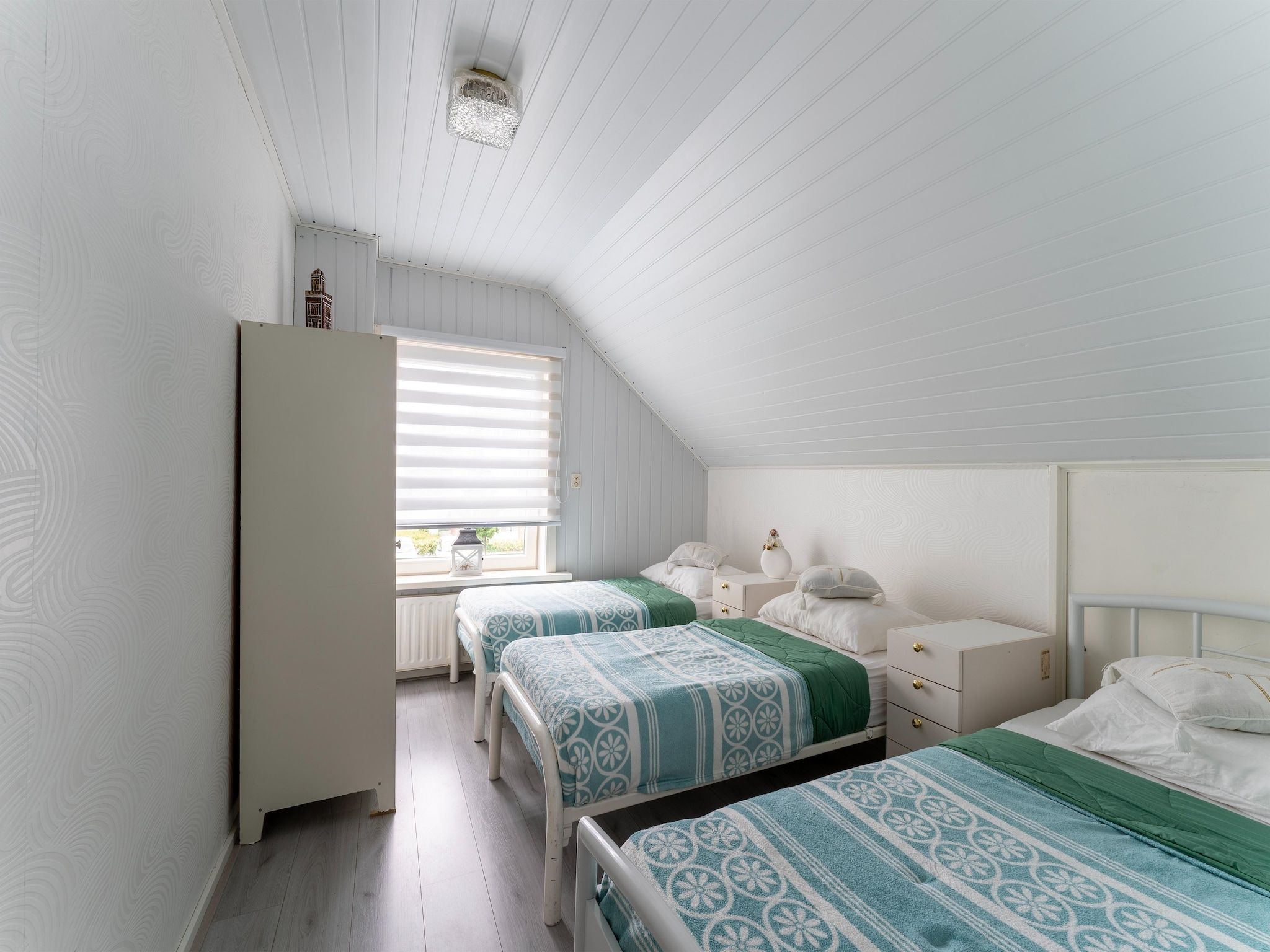 Een slaapkamer van Vakantiewoning Aarab in Vlissingen