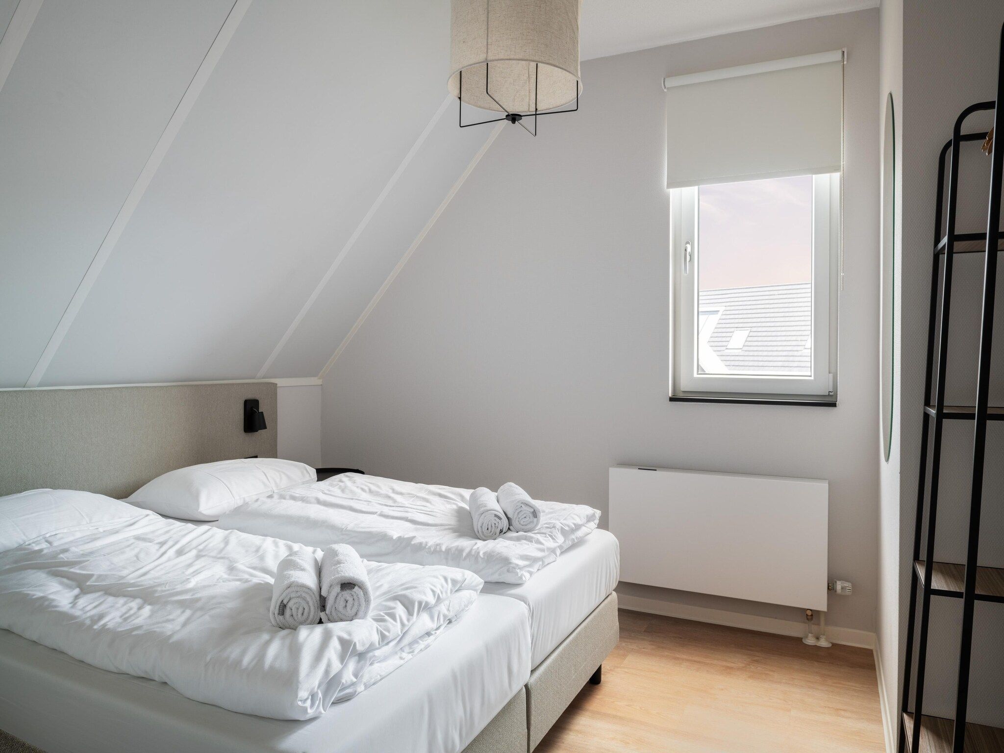 Een slaapkamer van Resort Nieuwvliet-Bad 1 in Nieuwvliet