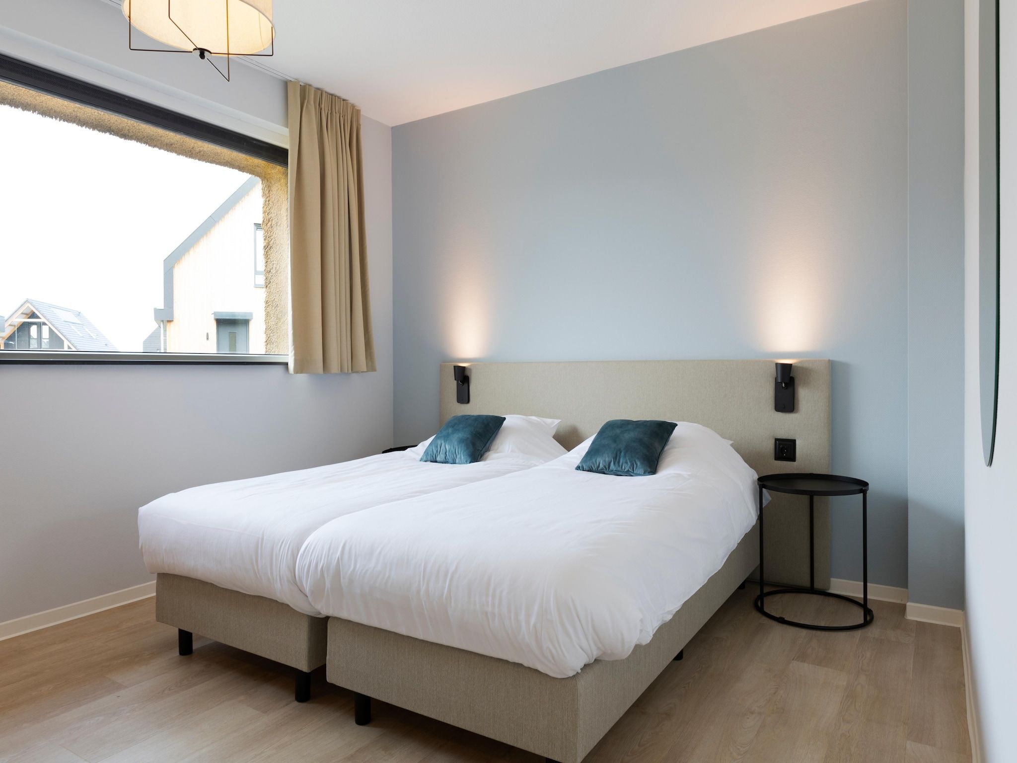 Een slaapkamer van Resort Nieuwvliet-Bad 13 in Nieuwvliet