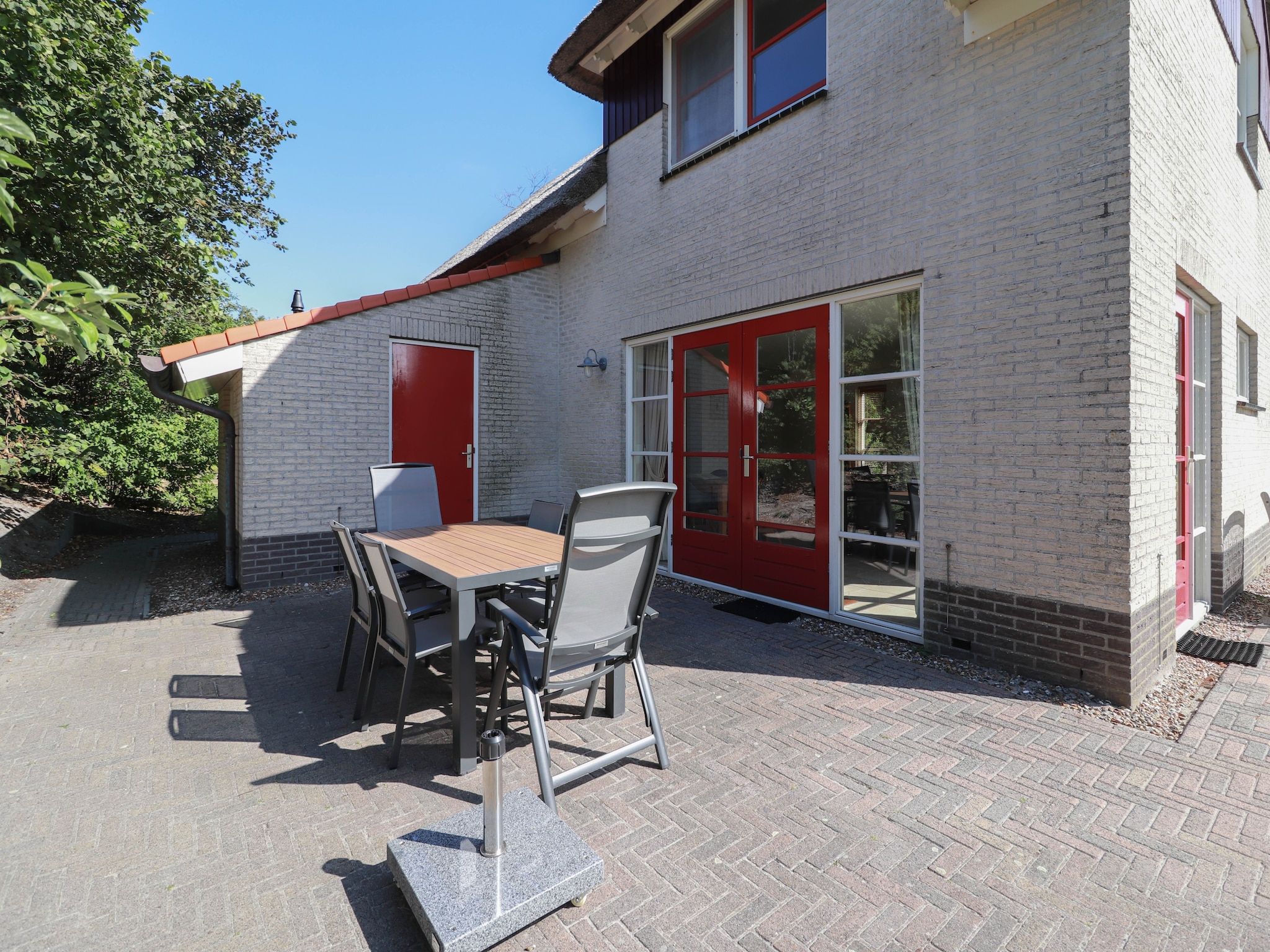 Het terras van Duinvilla - 6 personen in Makkum
