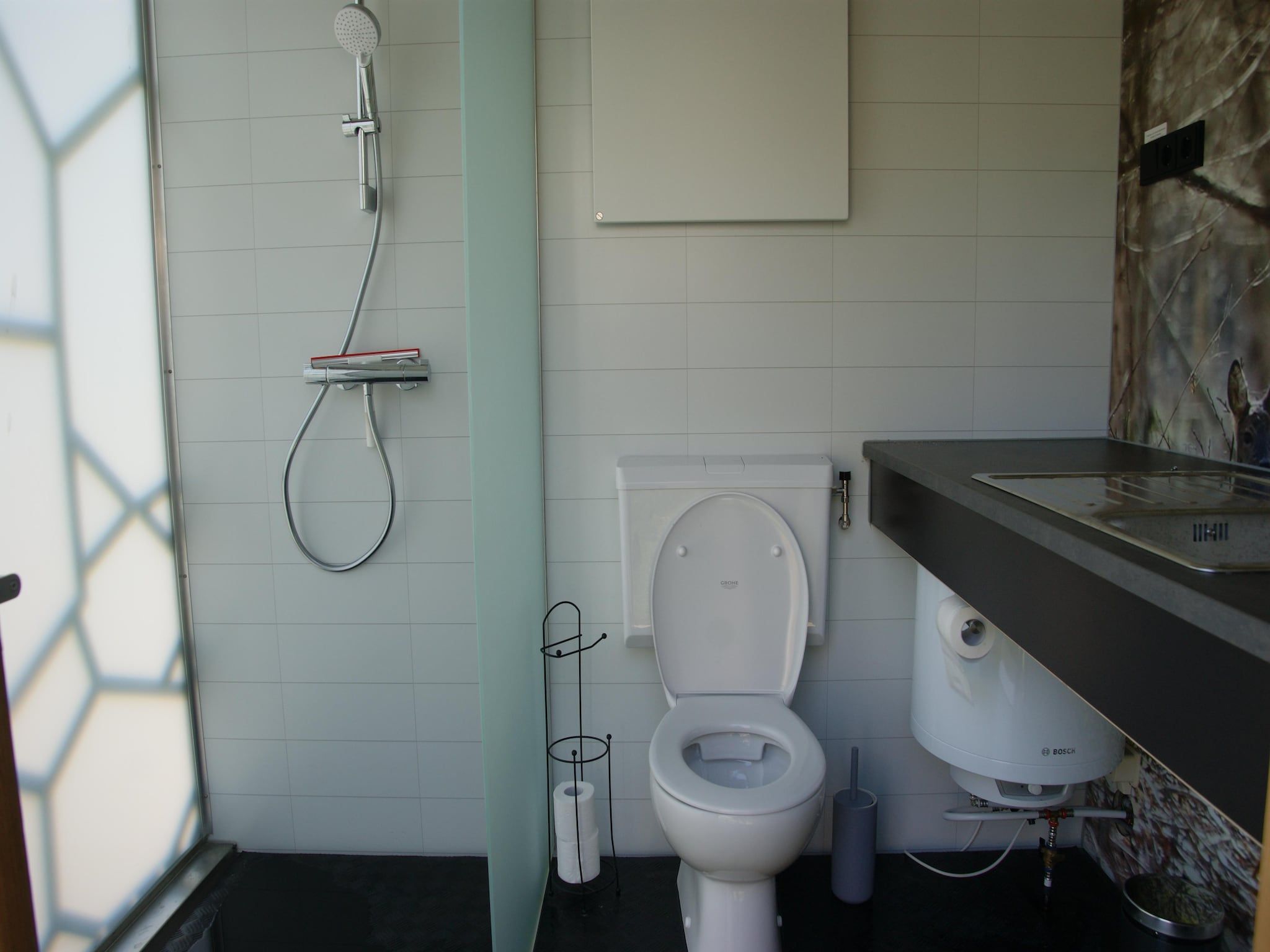 De badkamer van Tentlodge Partijs Wellness met sauna en prive-bad-2p in Dalerveen