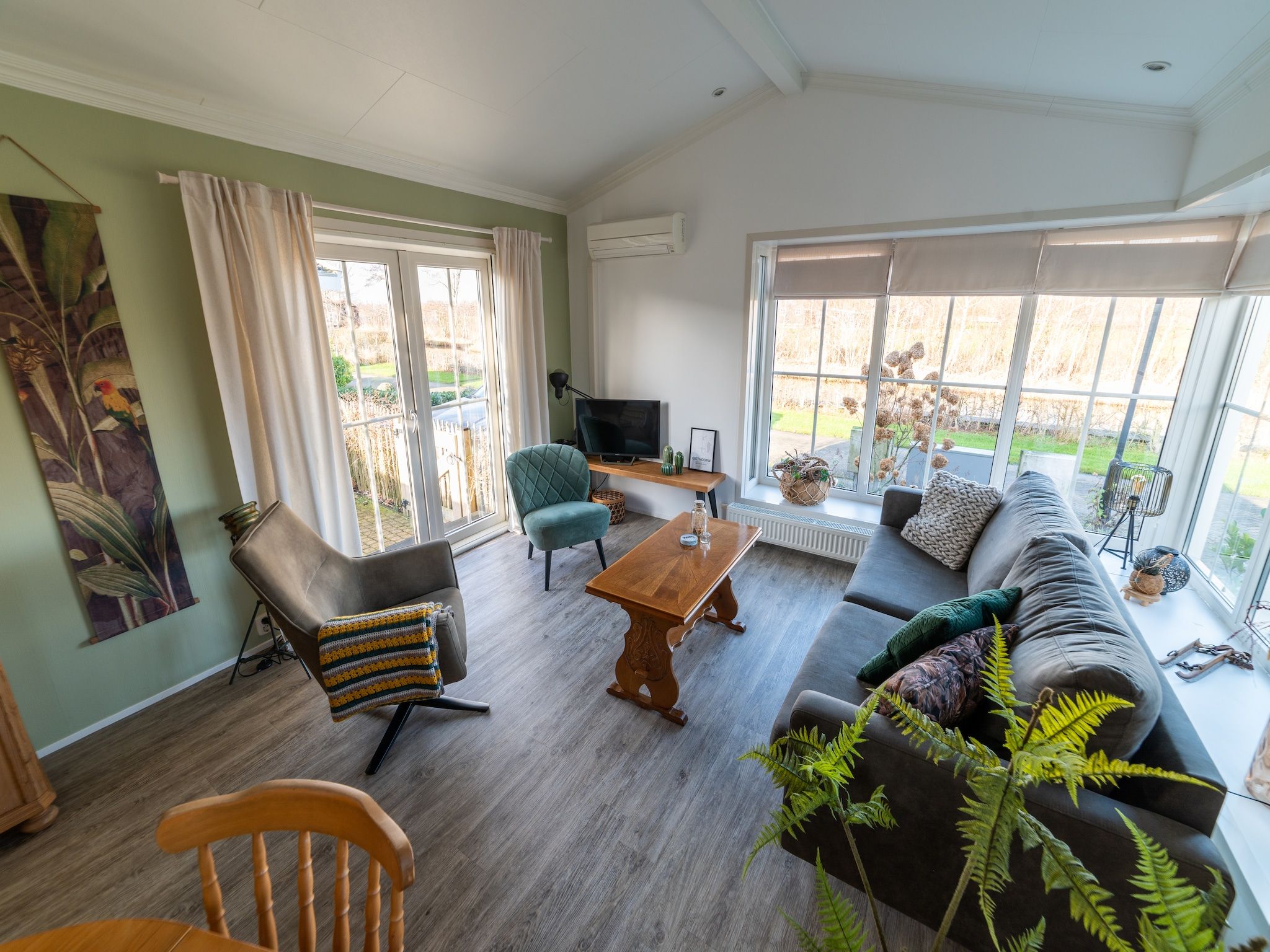 De woonkamer van Chalet Resort Venetie Giethoorn in Giethoorn