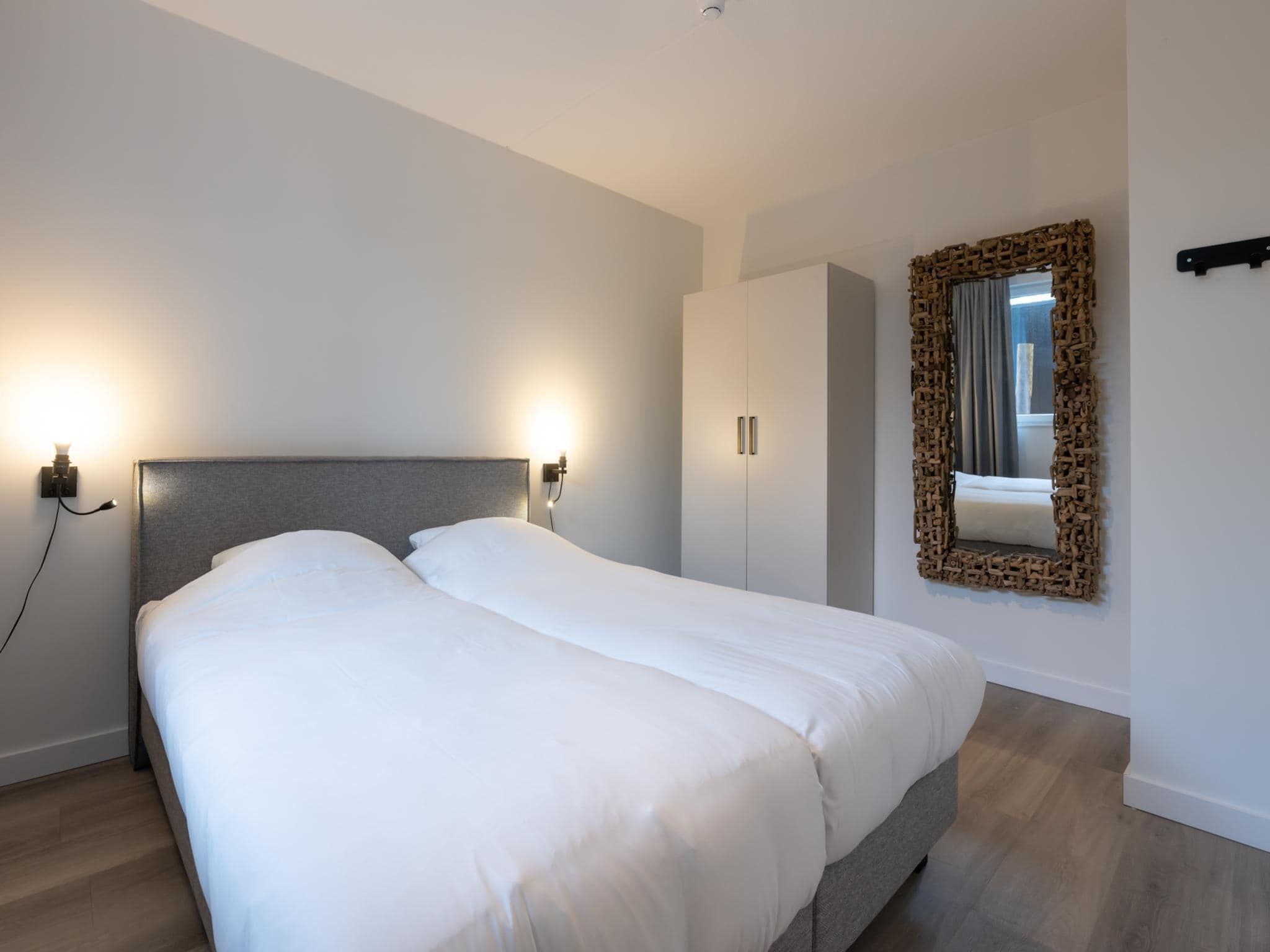 Een slaapkamer van Harbour Loft 1E Résidence Marina havenzicht in Kamperland