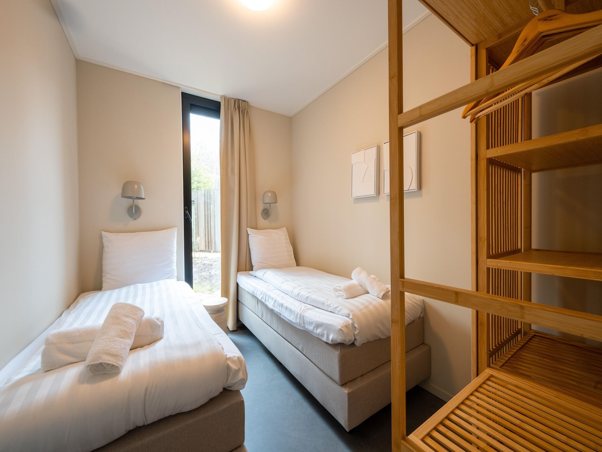 Een slaapkamer van Resort de Parel 13 in Zeewolde