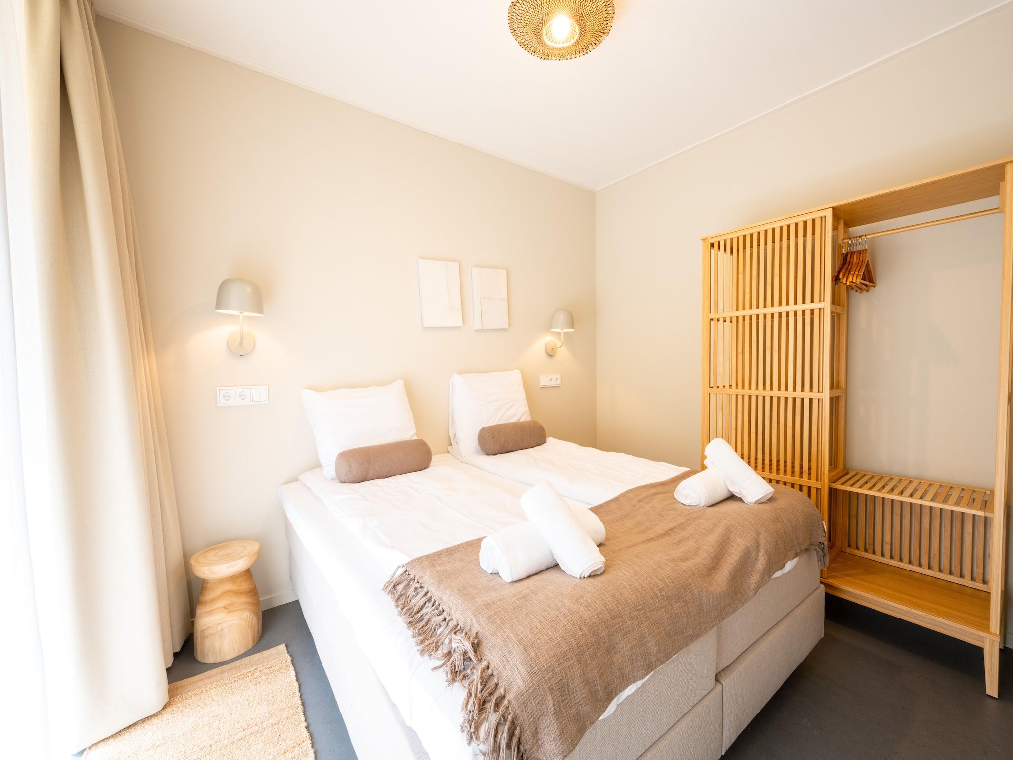Een slaapkamer van Resort de Parel 16 in Zeewolde