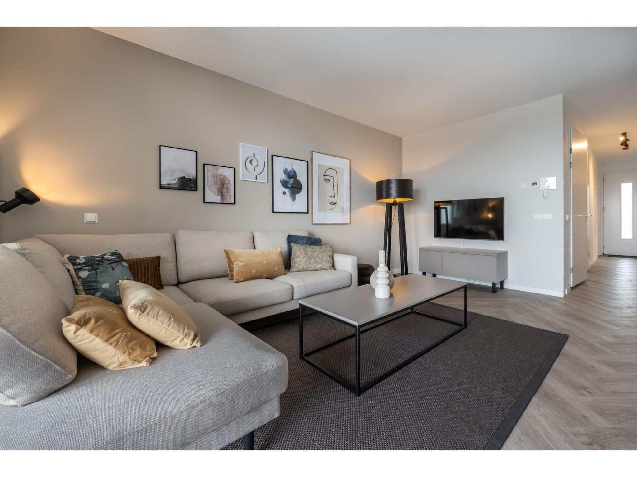 De woonkamer van Harbour Loft1J-havenzicht in Kamperland
