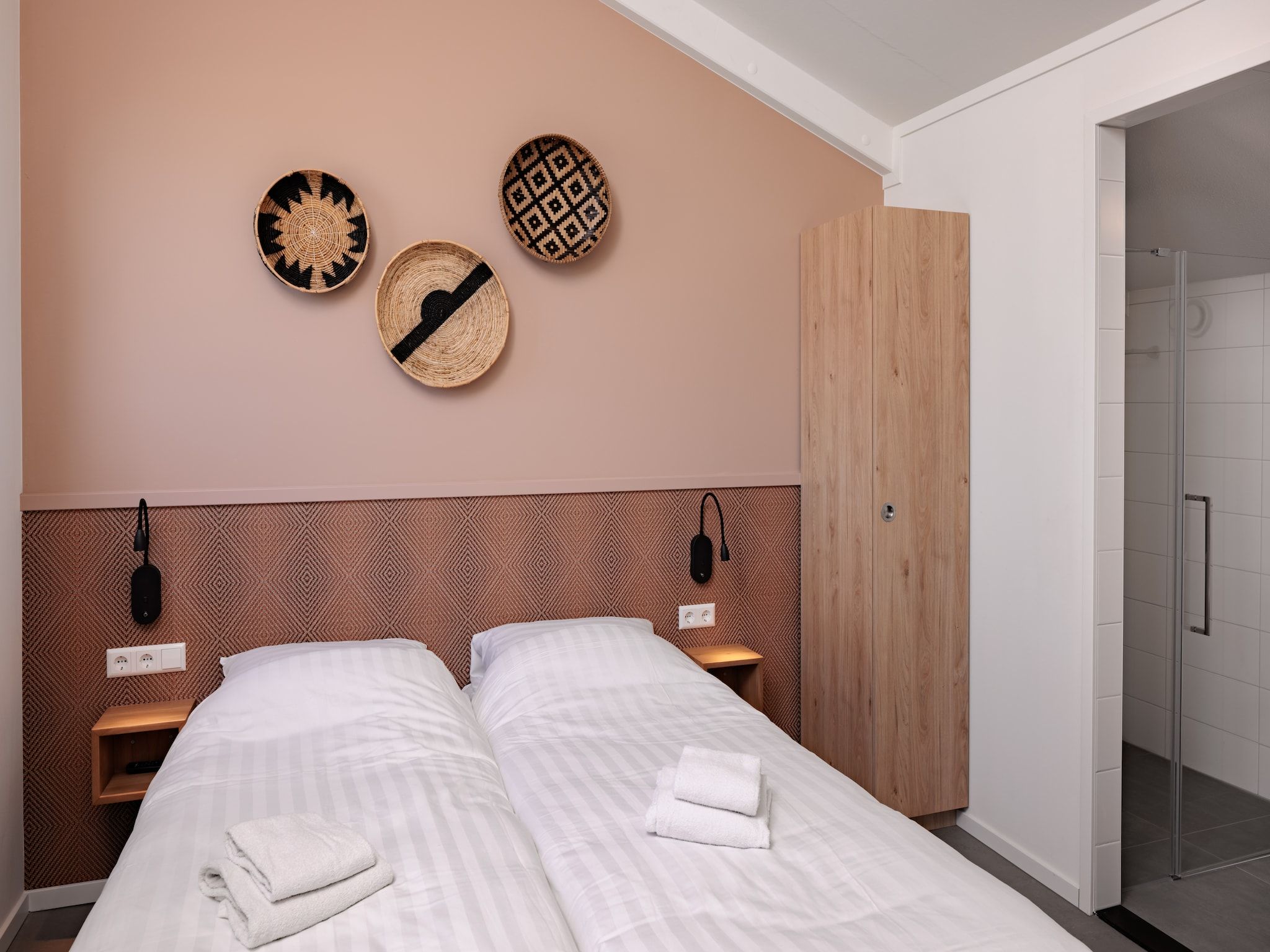 Een slaapkamer van Duinresort Dunimar 3 in Noordwijkerhout