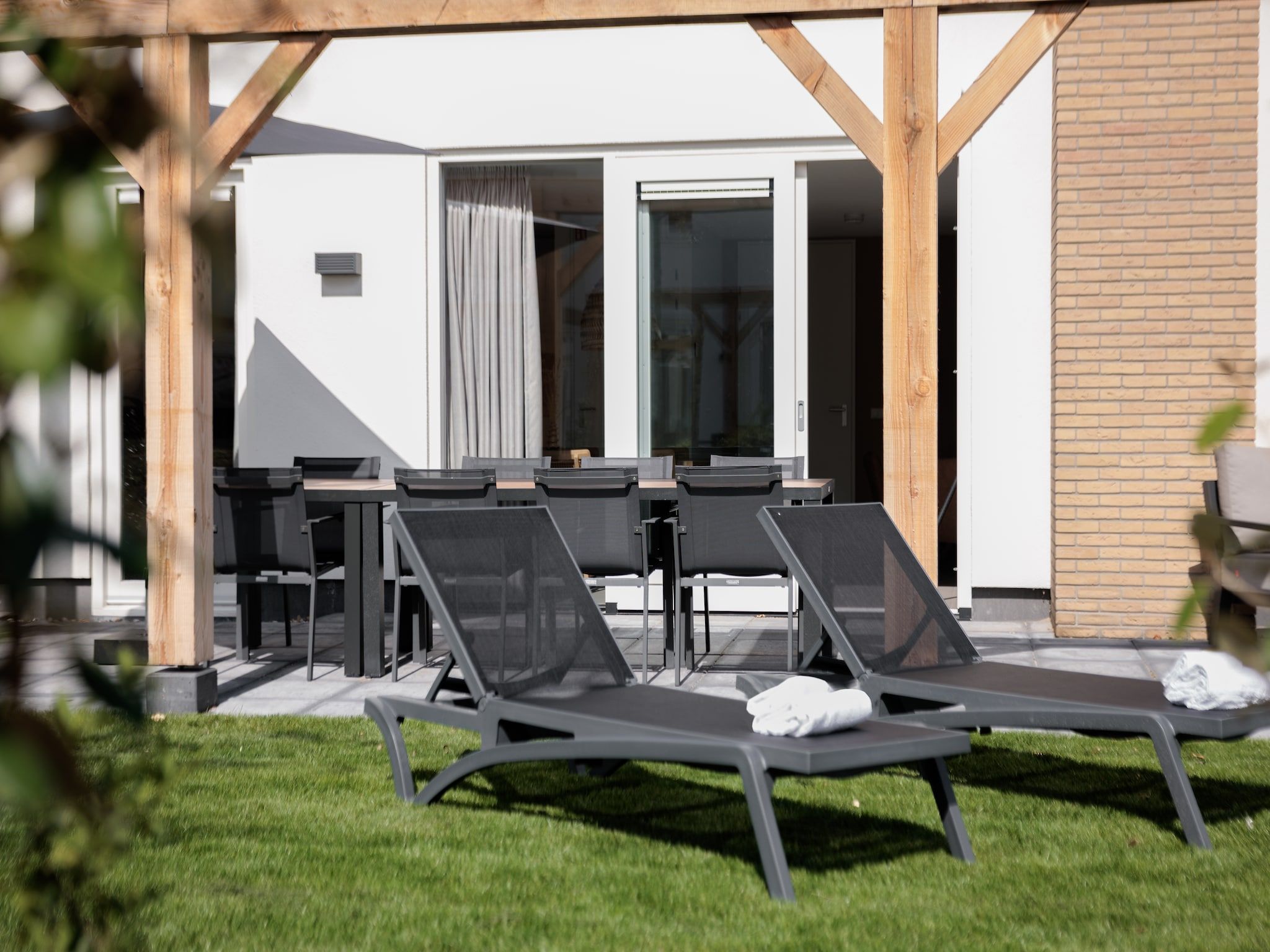 De tuin van Duinresort Dunimar 4 in Noordwijkerhout