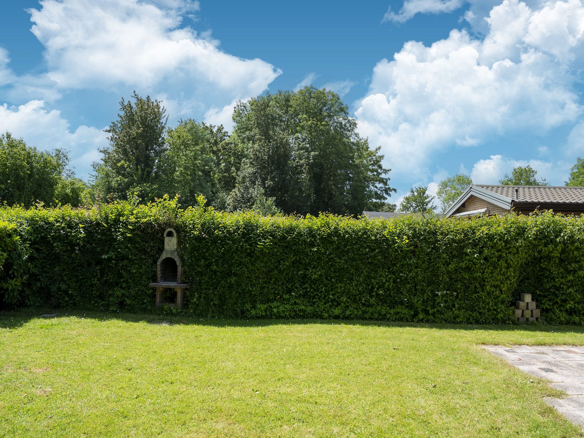 De tuin van Landingsweg 80 in Baarland