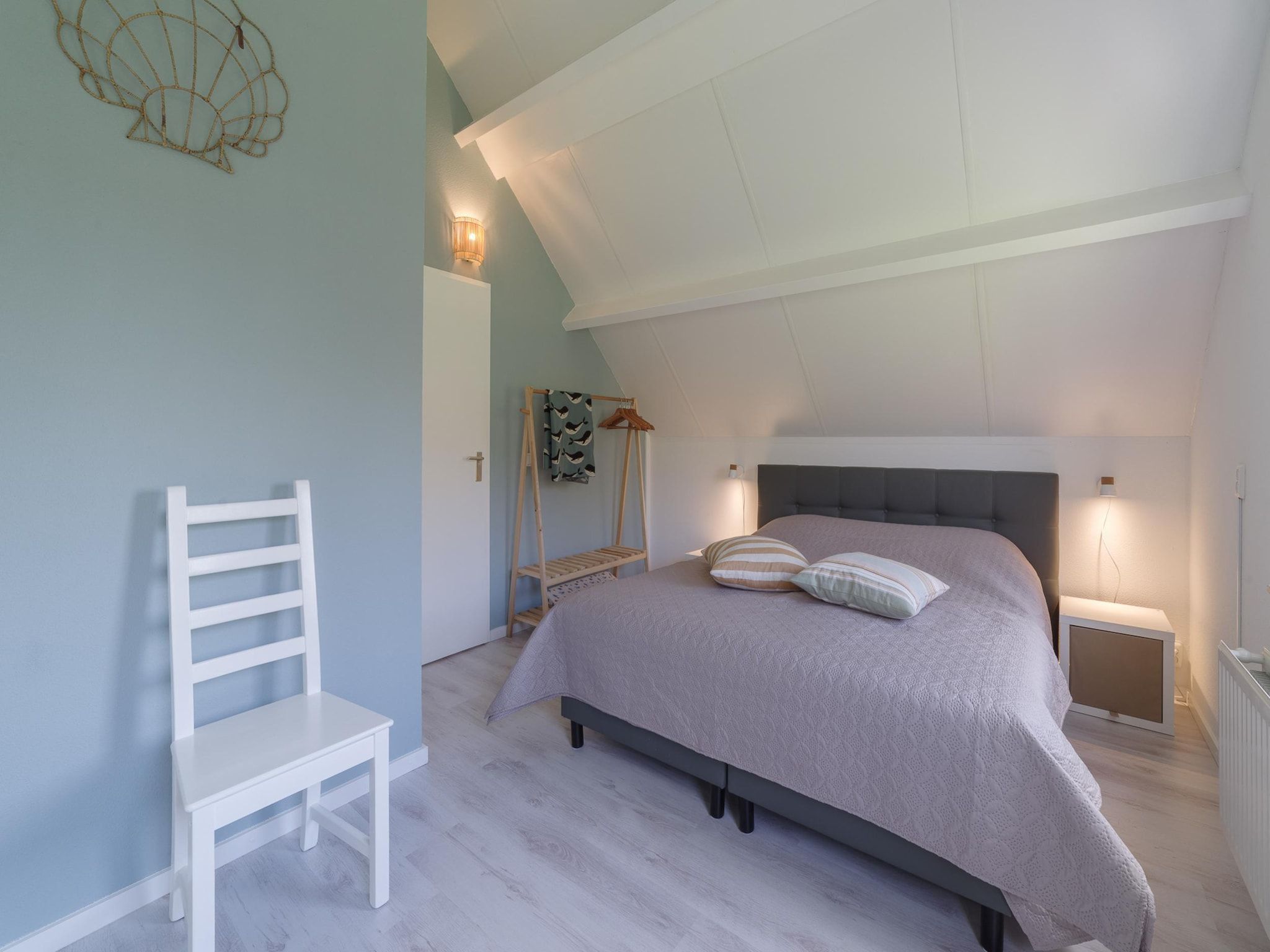 Een slaapkamer van Villapark De Oesterbaai 68 in Wemeldinge