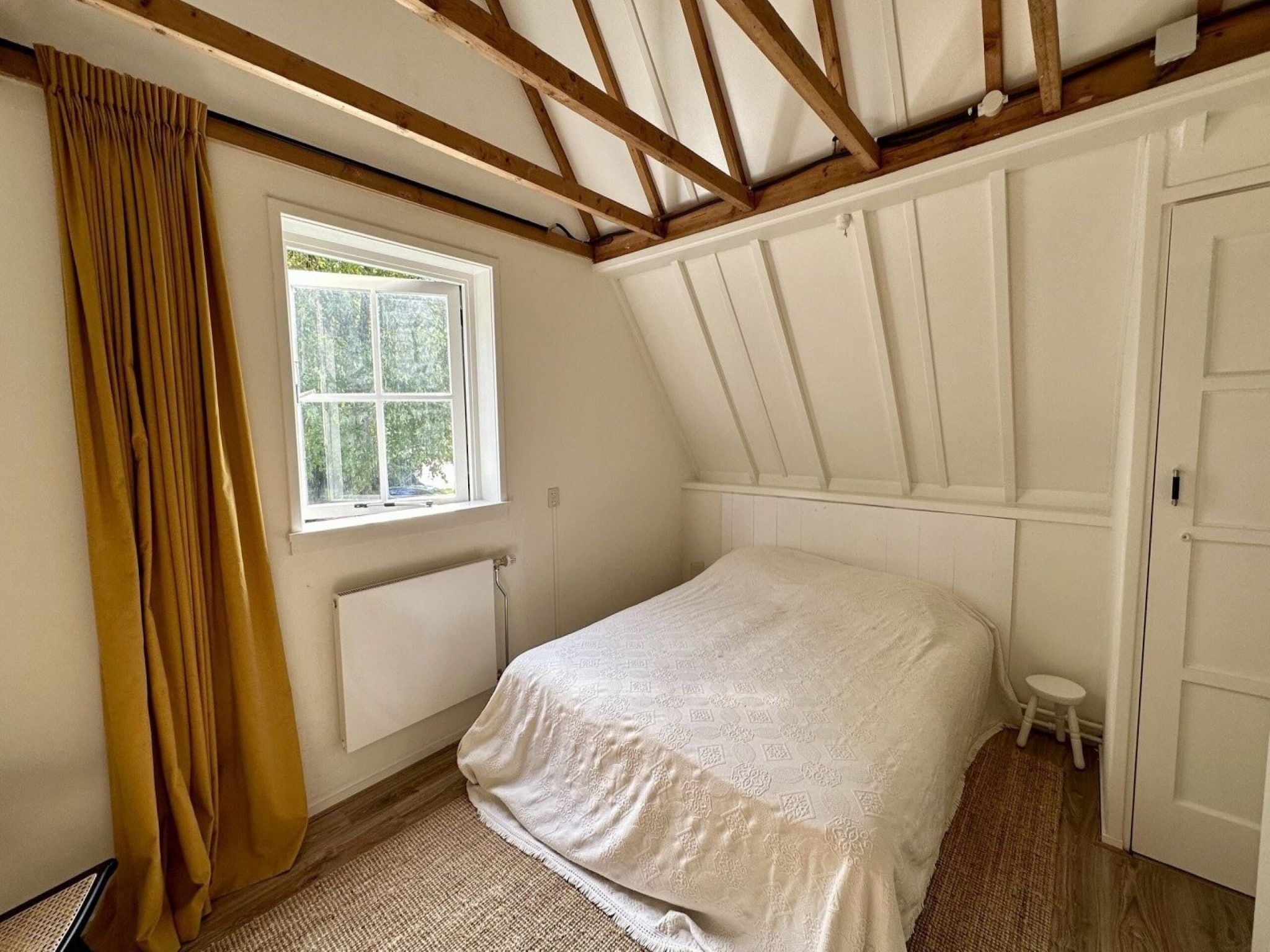 Een slaapkamer van Vakantiehuis Fijn in Bergen