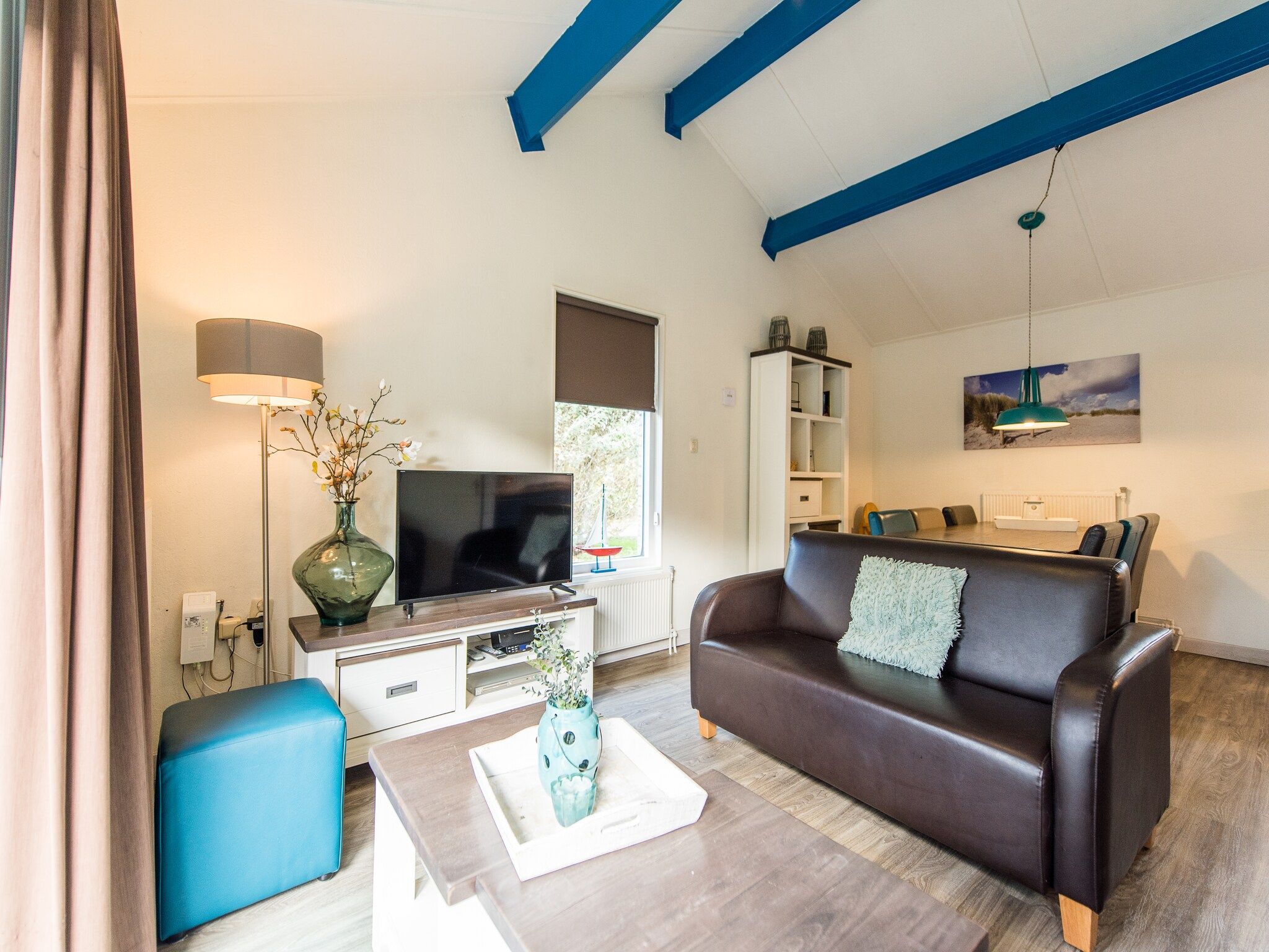 De woonkamer van Vakantiepark Boomhiemke 17 in Hollum