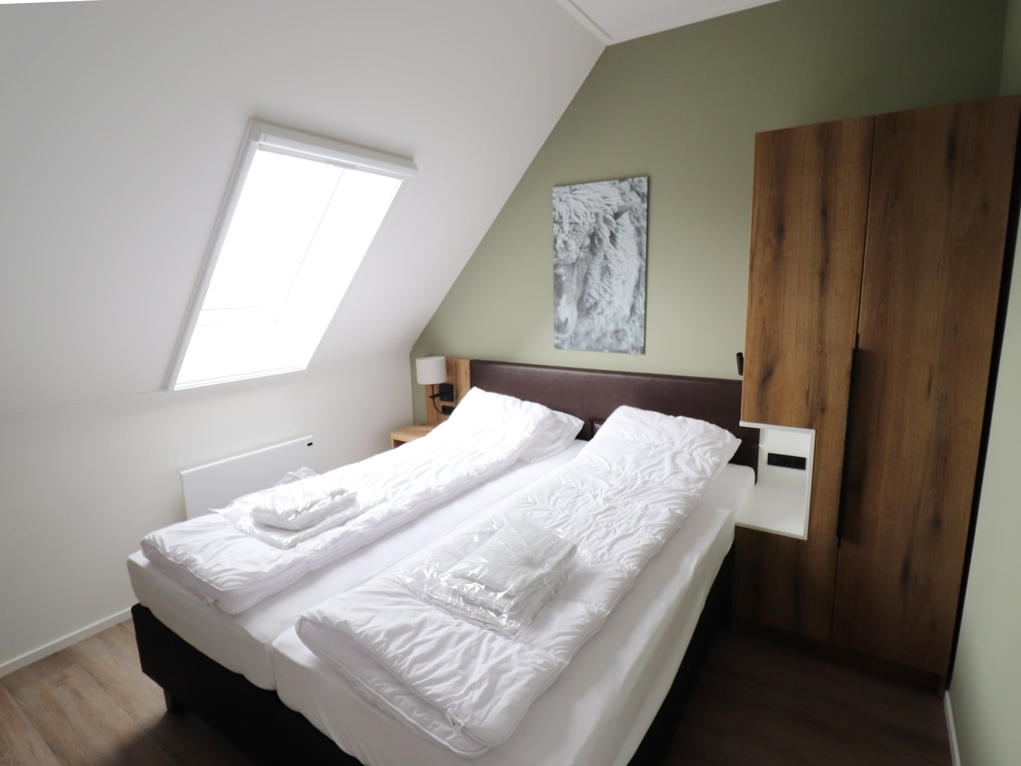 Een slaapkamer van Friese Villa in Leons in Leons