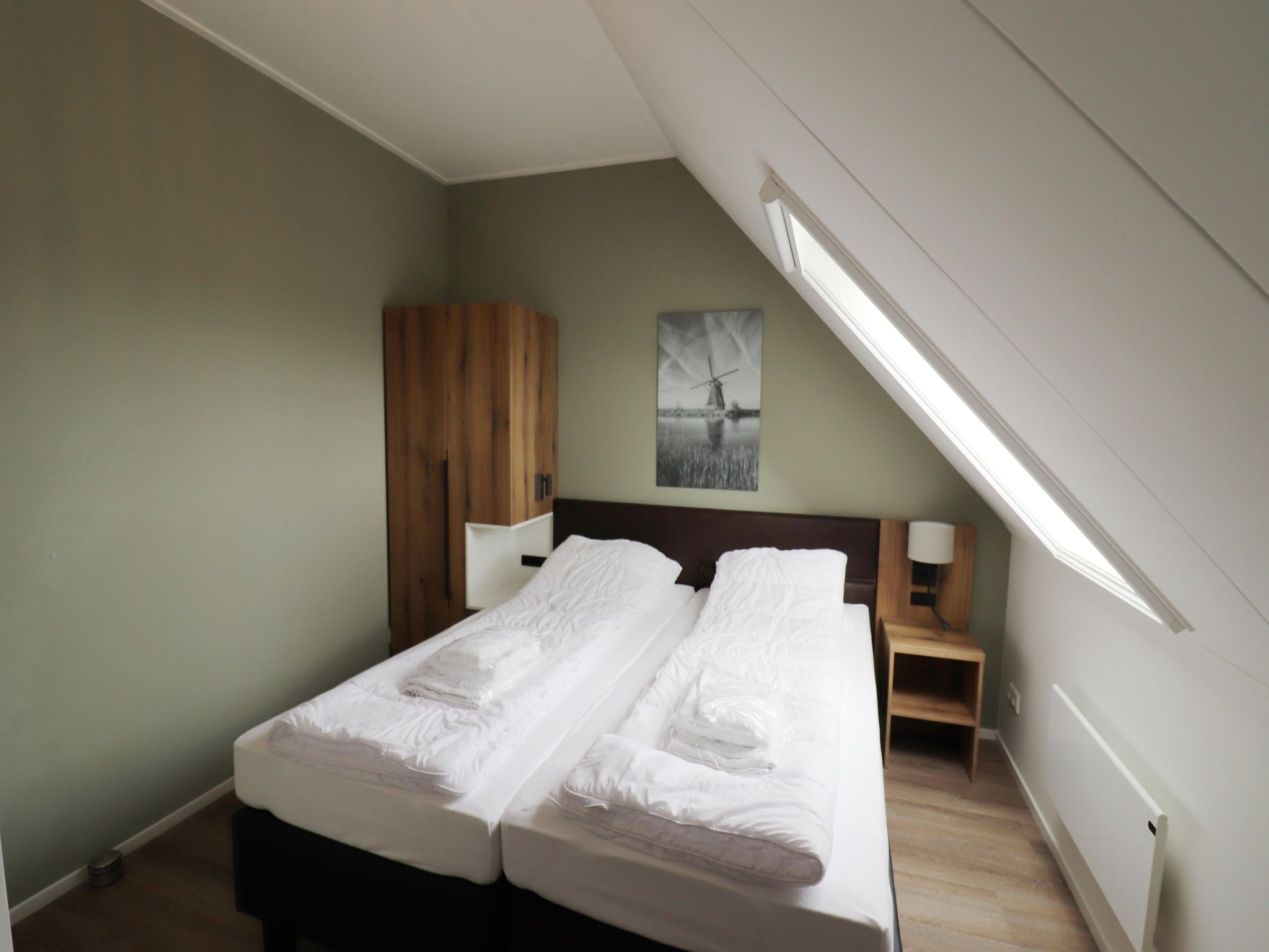 Een slaapkamer van Friese Villa in Leons in Leons