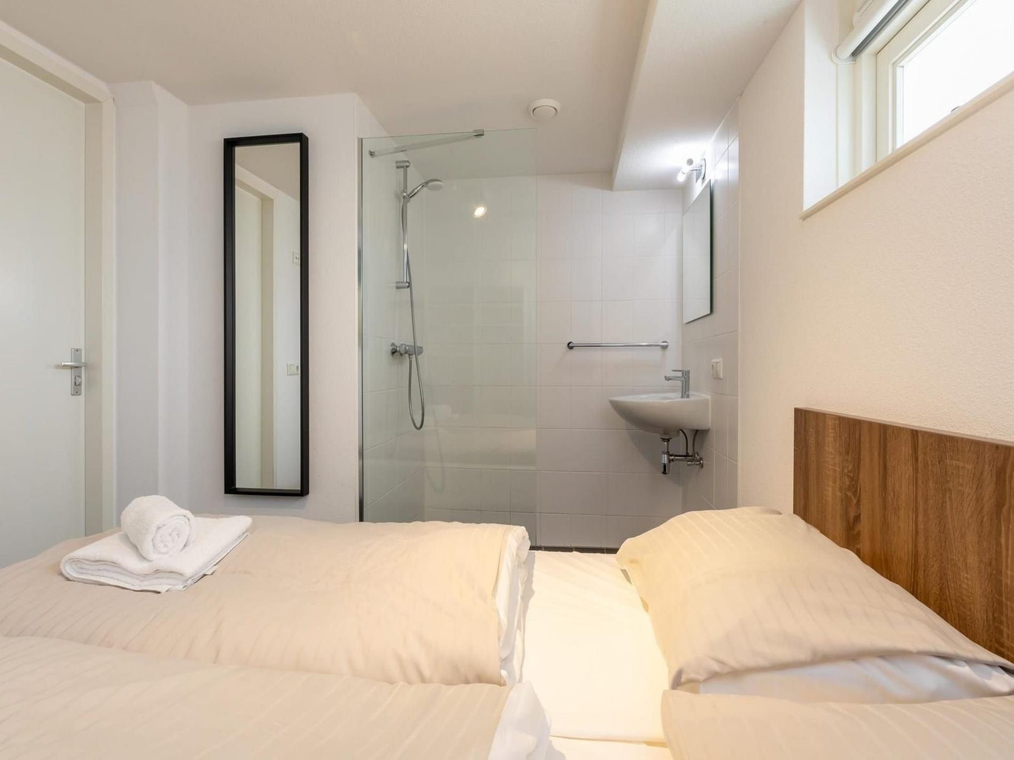 Een slaapkamer van Strandvilla 30 in Renesse