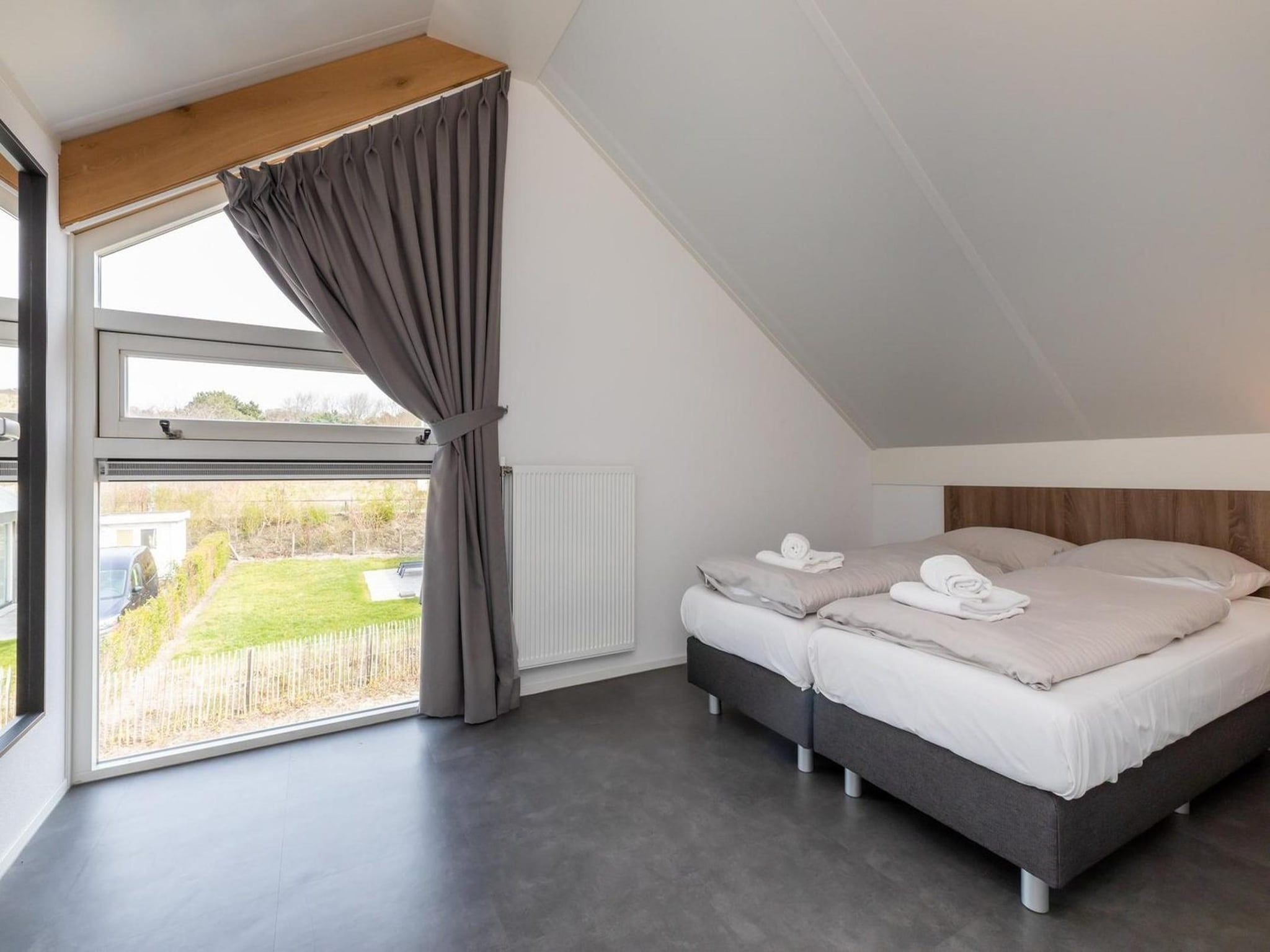 Een slaapkamer van Strandvilla 30 in Renesse