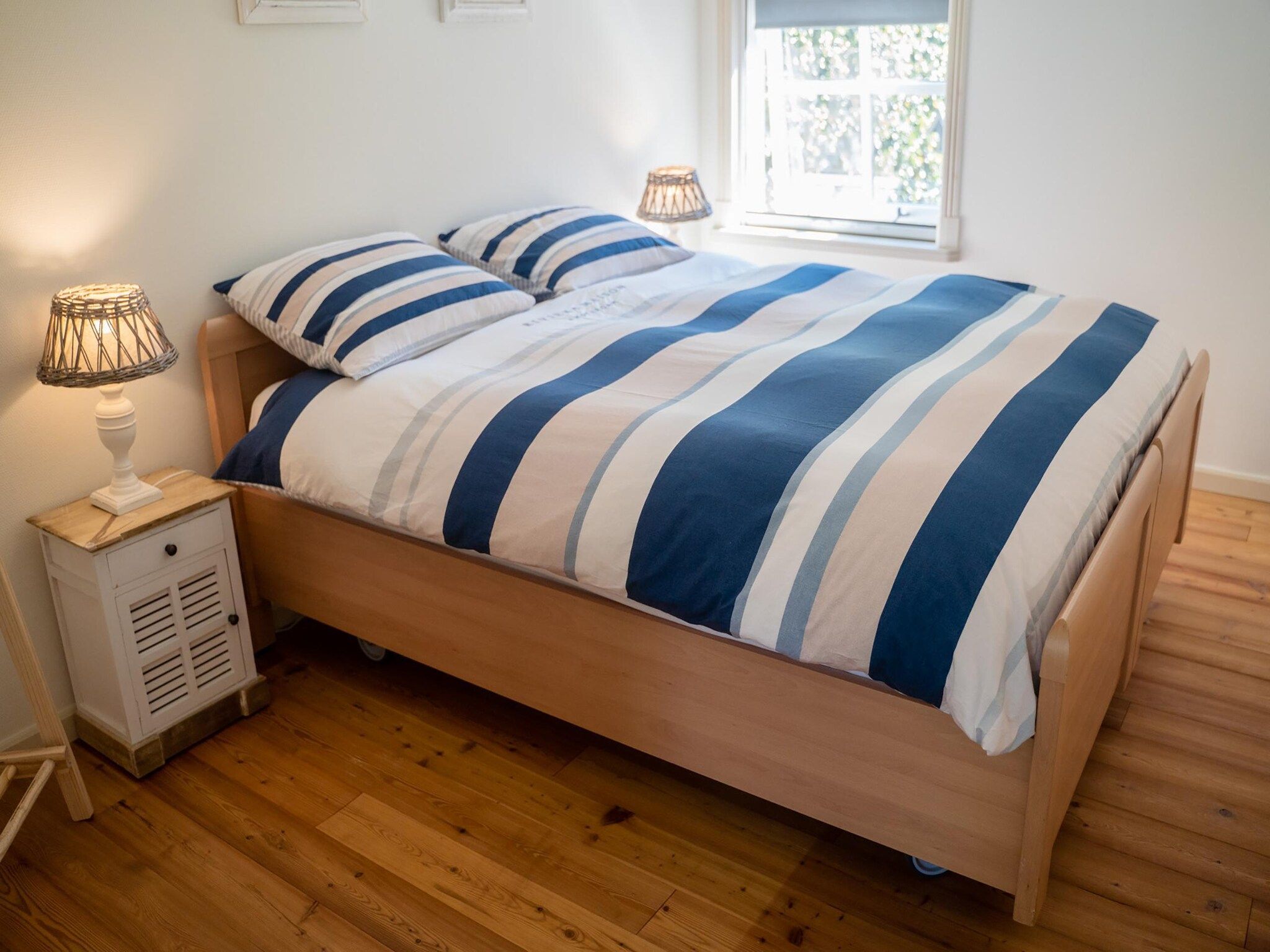 Een slaapkamer van Wad’n Leven in Paesens