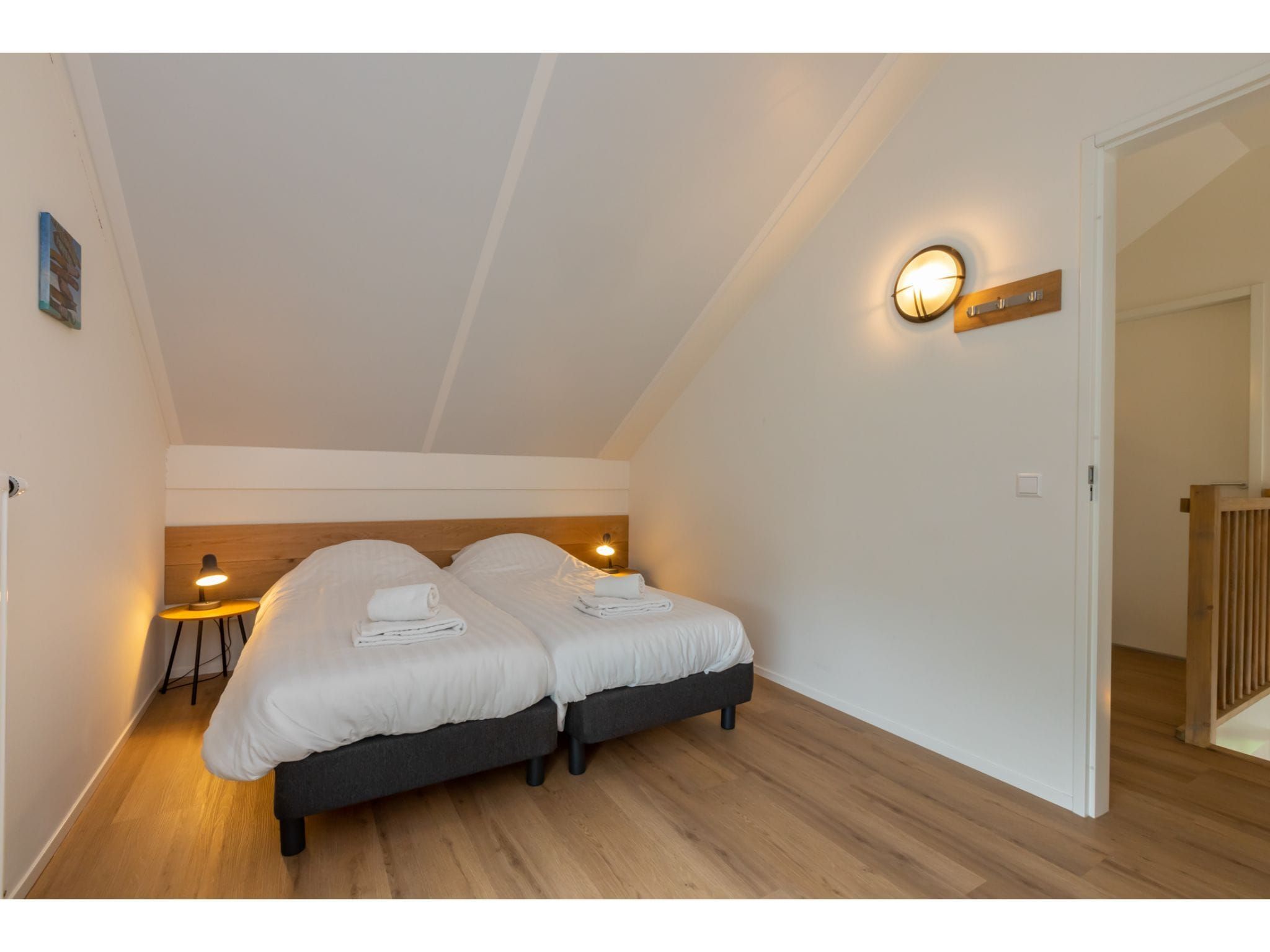 Een slaapkamer van Kloosterweg 85 in Burgh Haamstede