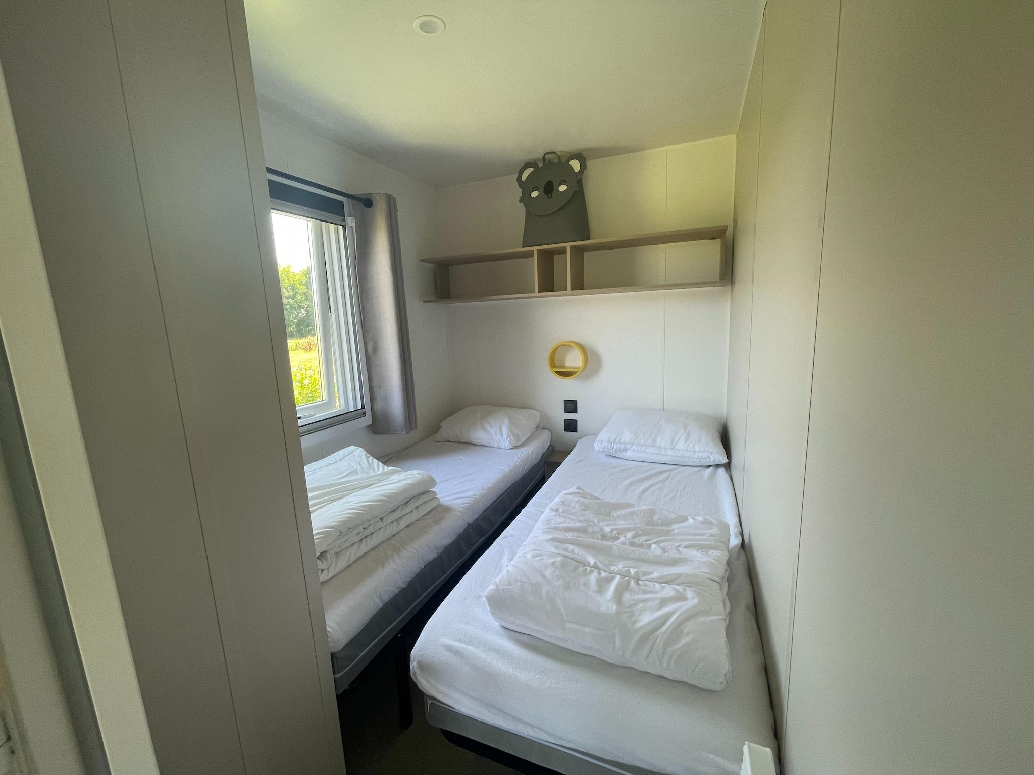 Een slaapkamer van Elperhof Leberenlodge in Schoonloo