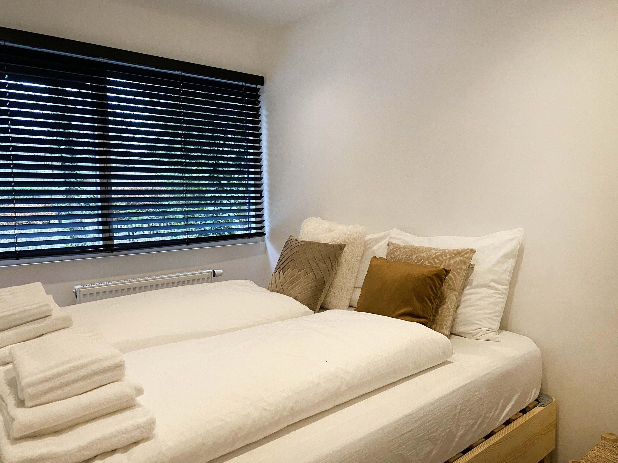 Een slaapkamer van Dutch Cabin Houses 45 in Rheezerveen