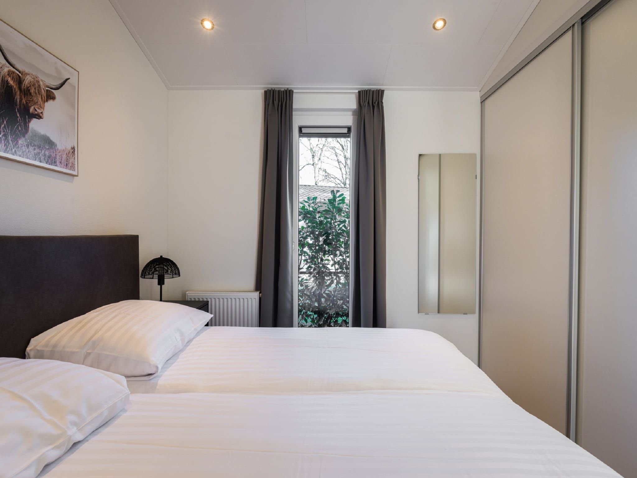 Een slaapkamer van Vakantiepark Latour 8 in Oirschot