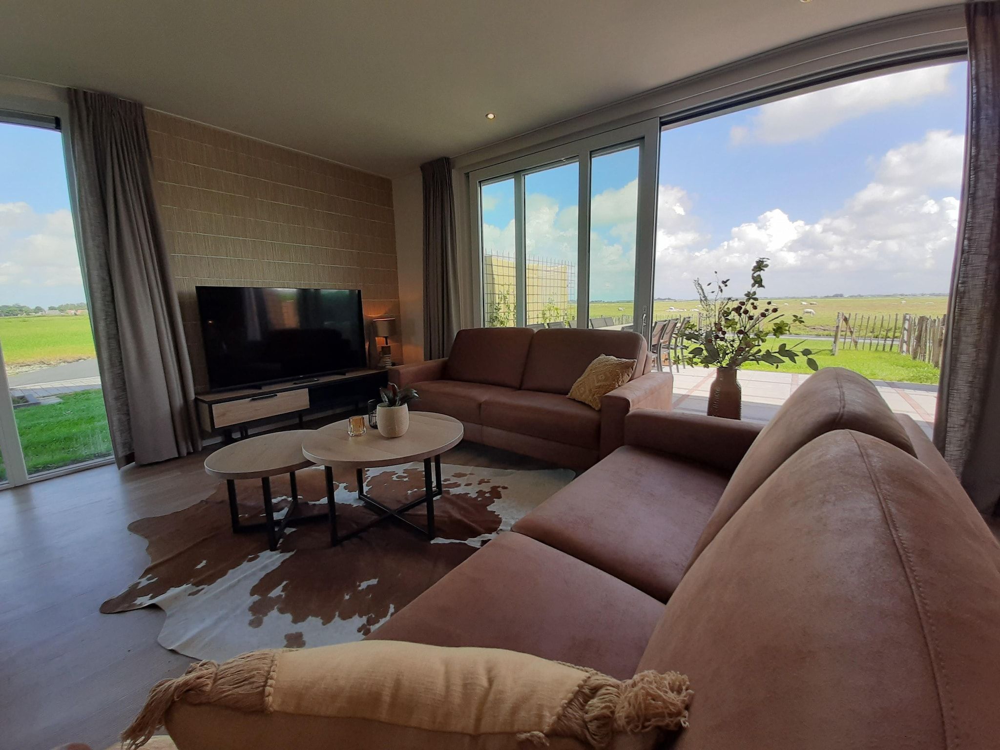 De woonkamer van 20 persoons villa in Leons