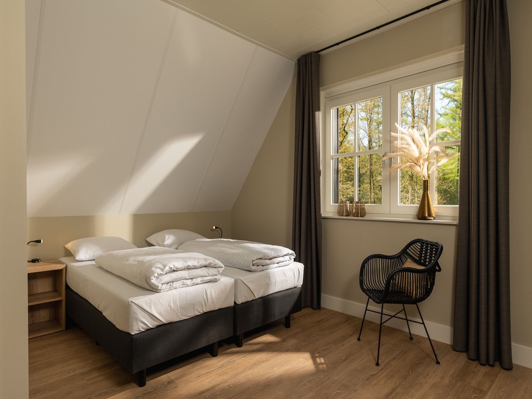Een slaapkamer van Het Landhuis in Losser