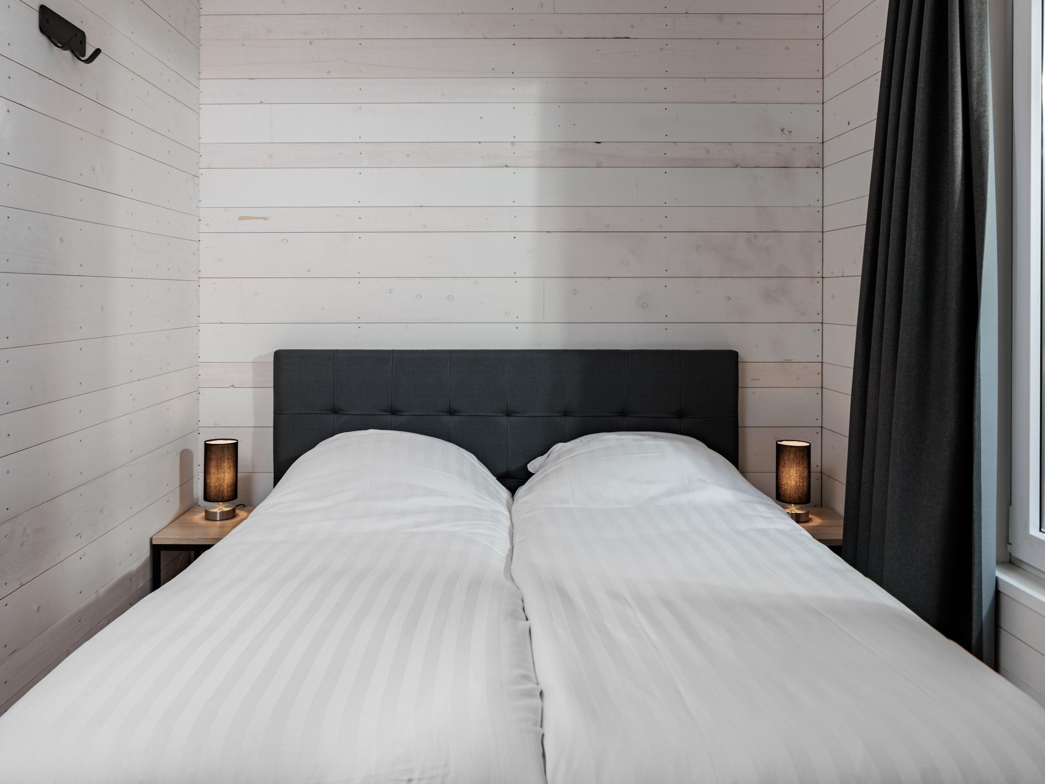 Een slaapkamer van Vakantiepark Schaijk 13 in Schaijk
