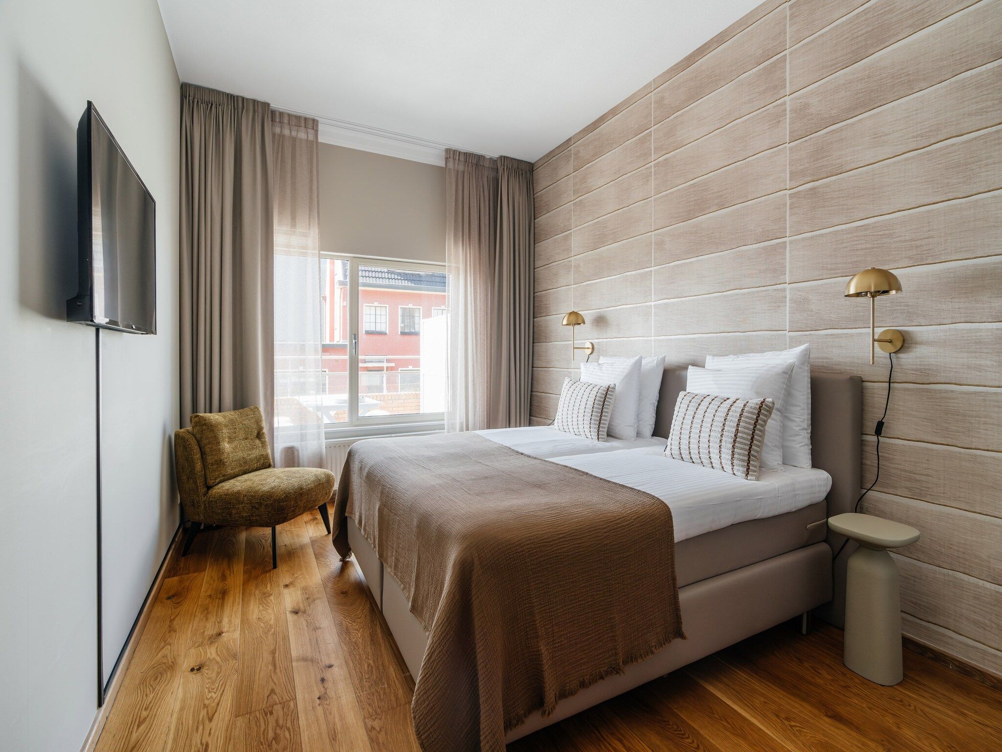 Een slaapkamer van Scheveningen Harbour 6B in Den Haag