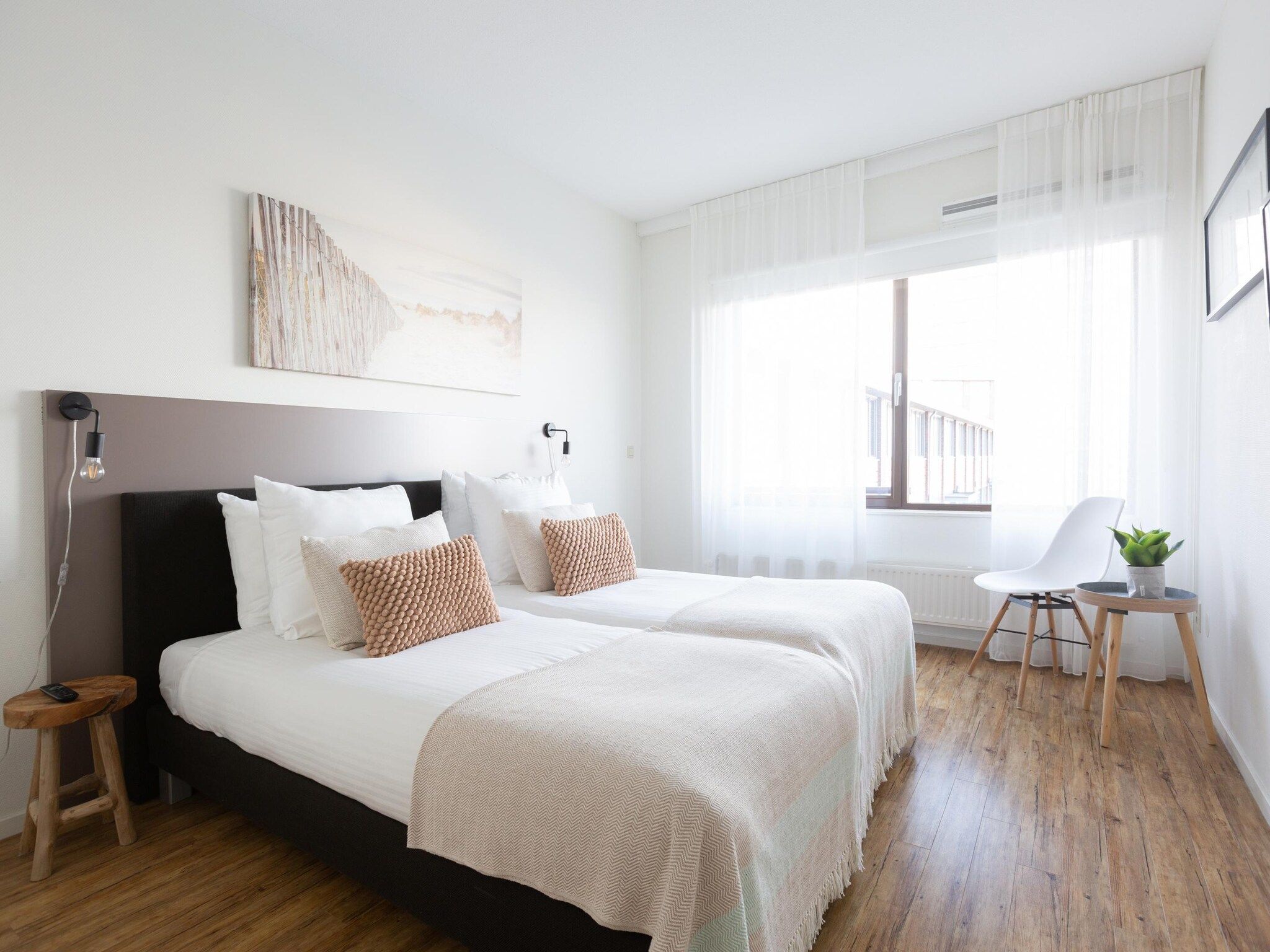 Een slaapkamer van Scheveningen Harbour 76 in Den Haag